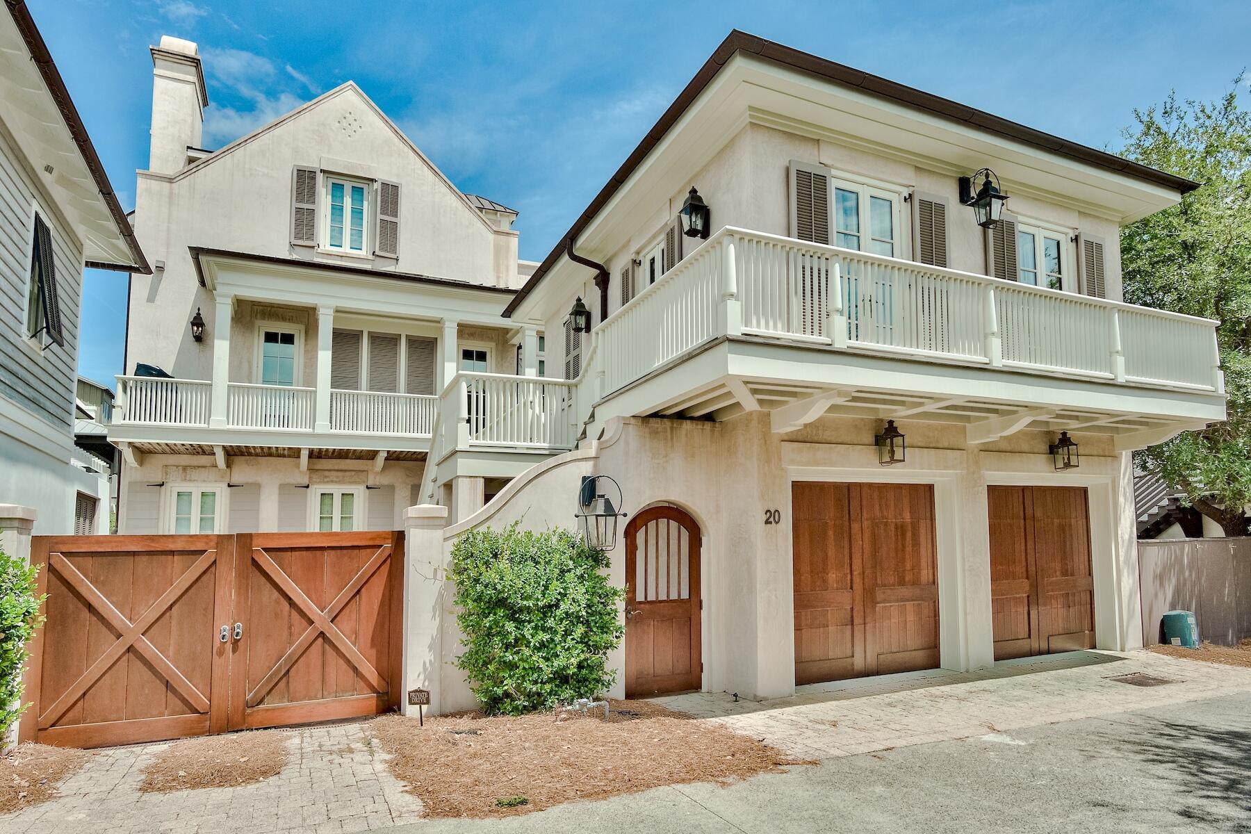 Welcome to 20 N Spanish Town Lane, a magnificent coastal estate located in the heart of Rosemary Beach. Enjoy breathtaking Gulf views from this stunning property that is just steps away from both the beach and the center of Rosemary Beach. Situated on boardwalk H, this prime location is perfect for those seeking the ultimate in relaxation and recreation.Built to a high standard, this custom all masonry block home with a copper roof is a true architectural masterpiece. The home is filled with unique details, ranging from pecky cypress ceiling inlays to brick and coastal wood flooring. The main house features three floors plus a finished basement, and the carriage house is connected via a 2nd-floor bridge walkway.This Rosemary Beach gem features a dramatic pool with a fountain backdrop