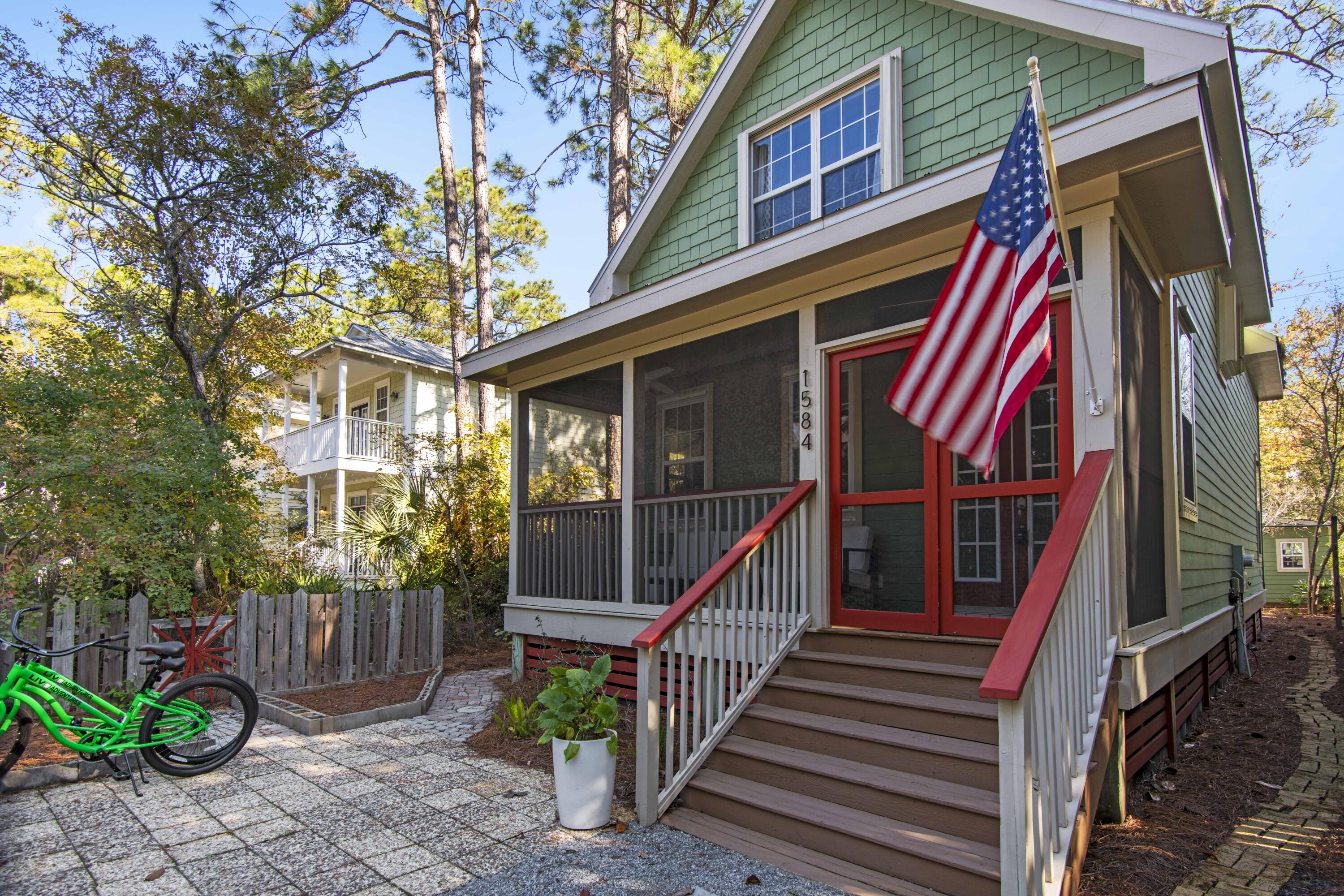 This charming coastal cottage has two bedrooms and two and one half baths. Located steps from (approx.0.1 mi) from the public boat ramp in the town of Santa Rosa Beach with access to the beautiful Choctawhatchee Bay. Enjoy a short stroll to fish, kayak, paddle board, or launch a boat and spend a day on the water. Enjoy the serene surroundings and easy access to 30A and the Emerald Coast Beaches.Every detail, including the new kitchen design in 2022 with white quartzite, brass fixtures, and custom lighting are just a few of the serene touches curating a modern feel within the classic cottage. A neutral palette, hardwood floors, wood beams, and an abundance of natural light create the perfect beach residence. The front porch leads you to a cozy living area that flows easily into the dining area. The open floor plan is complete with a breakfast bar and additional breakfast area.

Relax on your covered and screened back porch off of the kitchen with a cup of coffee or glass of wine. Step outside to your garden shed and start the day nurturing your farm to table garden. Take one of the winding stone paths on each side of the cottage to reach the front gardens.

As you ascend the stairs there is a split floor plan with two bedrooms and two full baths. A charming niche in between serves as a reading nook.

Located in the heart of Santa Rosa Beach and 3.4 miles from the Ed Walline Beach access and Gulf Place you are minutes to the emerald green waters. There are endless dining and entertainment options at Gulf Place. Catch a sunset at "Shunk Gulley". Enjoy the fresh catch fish tacos at "The Perfect Pig" and wind down the day with a toast at "Cava and Cakes".  For a european influence dine at Renaissance fronting the charming green featuring a farmers market, outdoor concerts, art shows, and wine festivals.