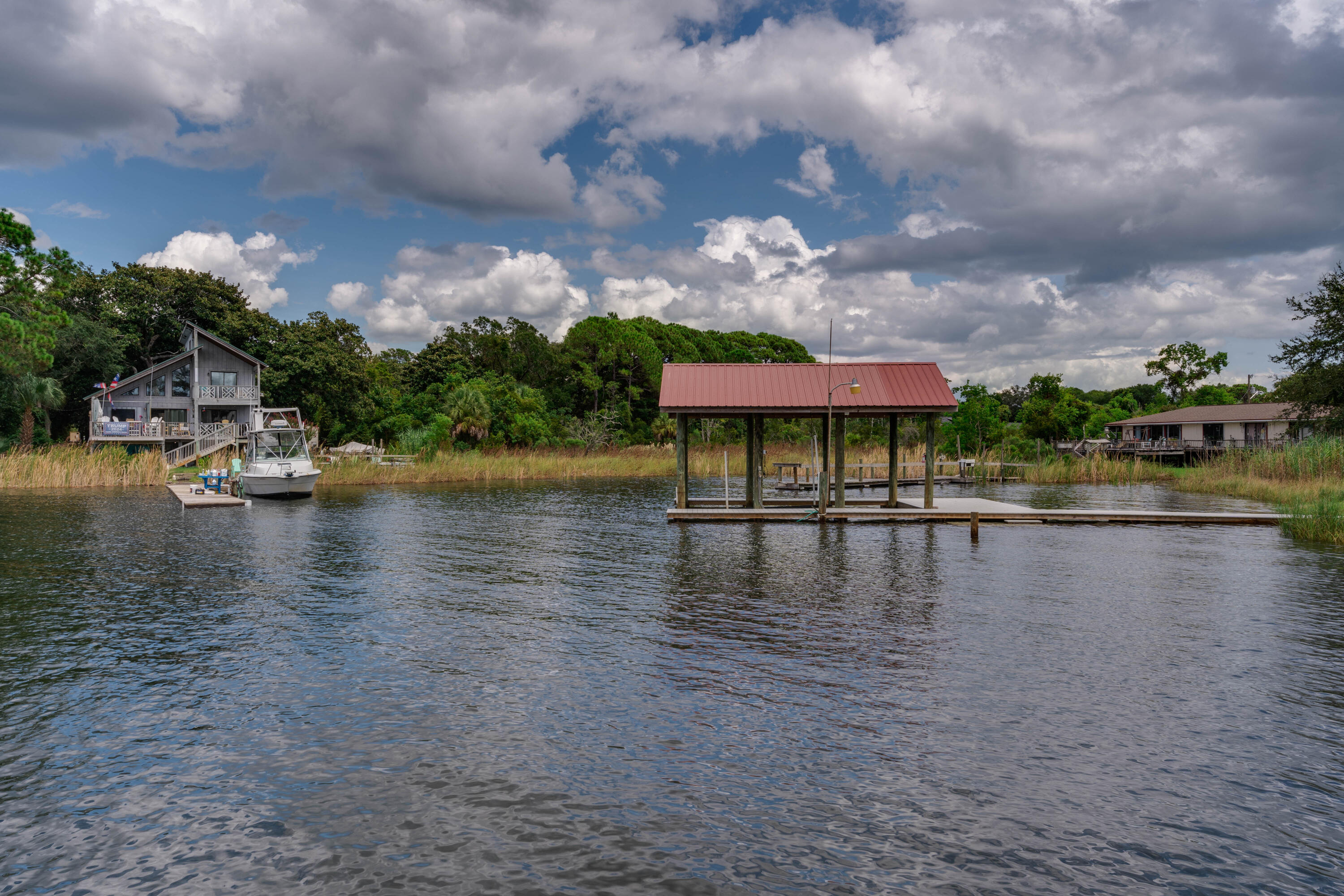 CALHOUN S/D DESTIN LOT 91 +BEG SW COR LOT 92 E 50 FT NW TO NE COR 91 THENCE S TO PT OF BEG BLK D 90 - Residential