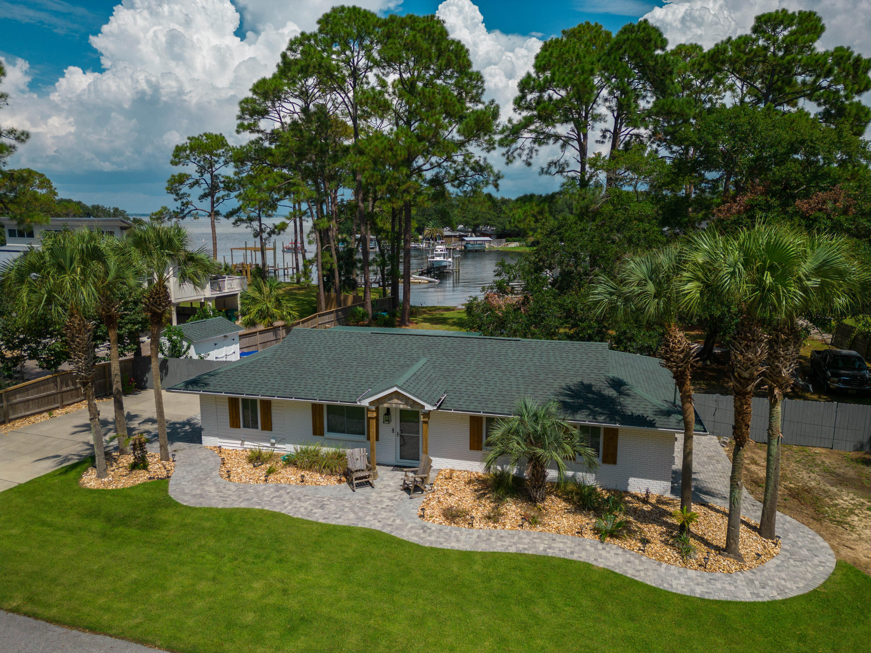 CALHOUN S/D DESTIN LOT 91 +BEG SW COR LOT 92 E 50 FT NW TO NE COR 91 THENCE S TO PT OF BEG BLK D 90 - Residential