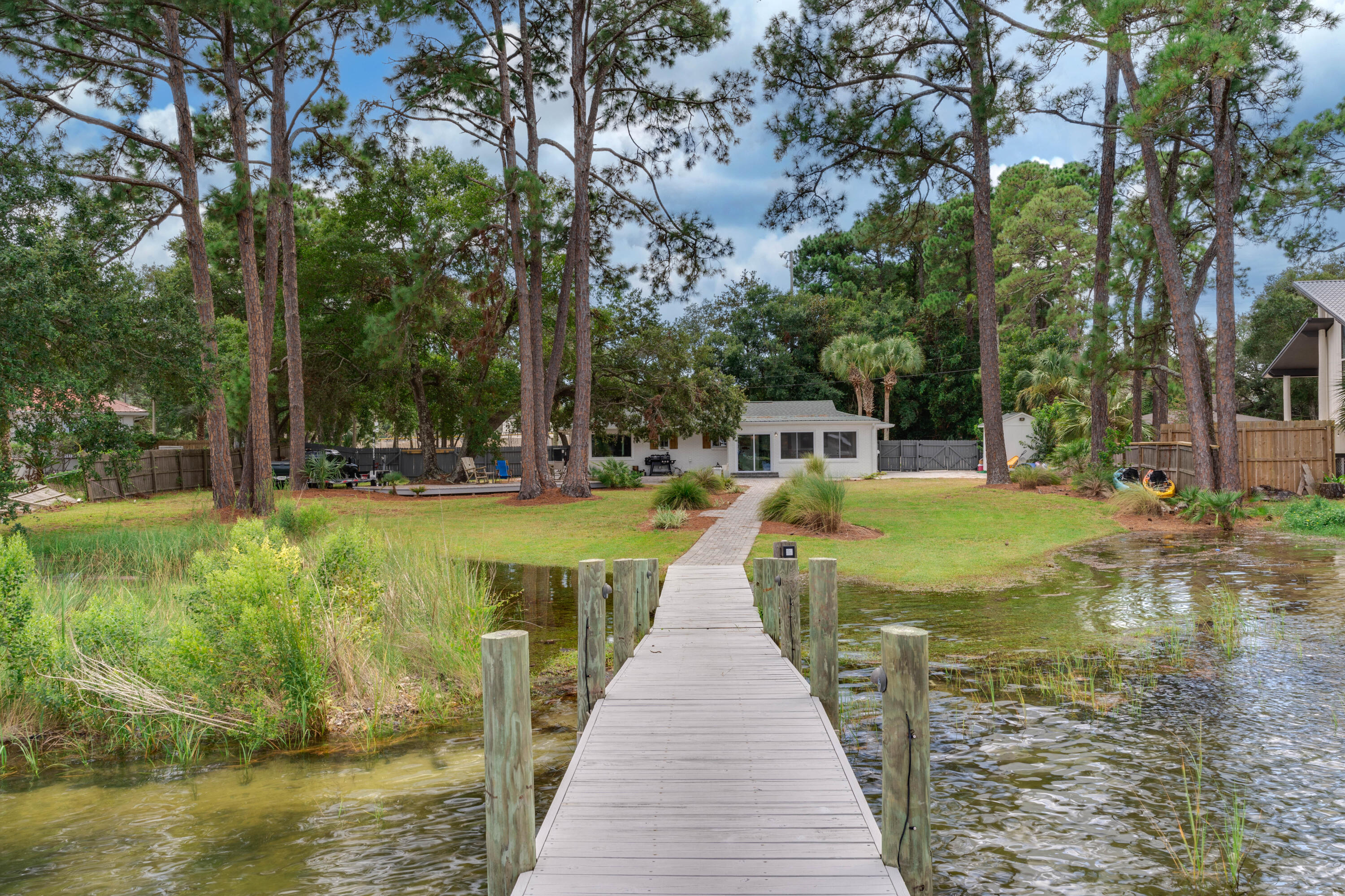 CALHOUN S/D DESTIN LOT 91 +BEG SW COR LOT 92 E 50 FT NW TO NE COR 91 THENCE S TO PT OF BEG BLK D 90 - Residential