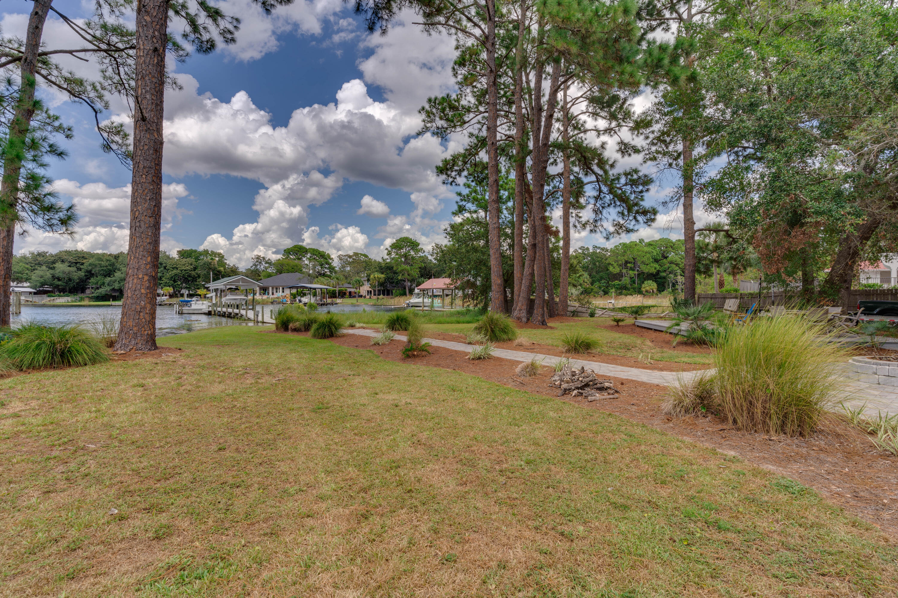 CALHOUN S/D DESTIN LOT 91 +BEG SW COR LOT 92 E 50 FT NW TO NE COR 91 THENCE S TO PT OF BEG BLK D 90 - Residential
