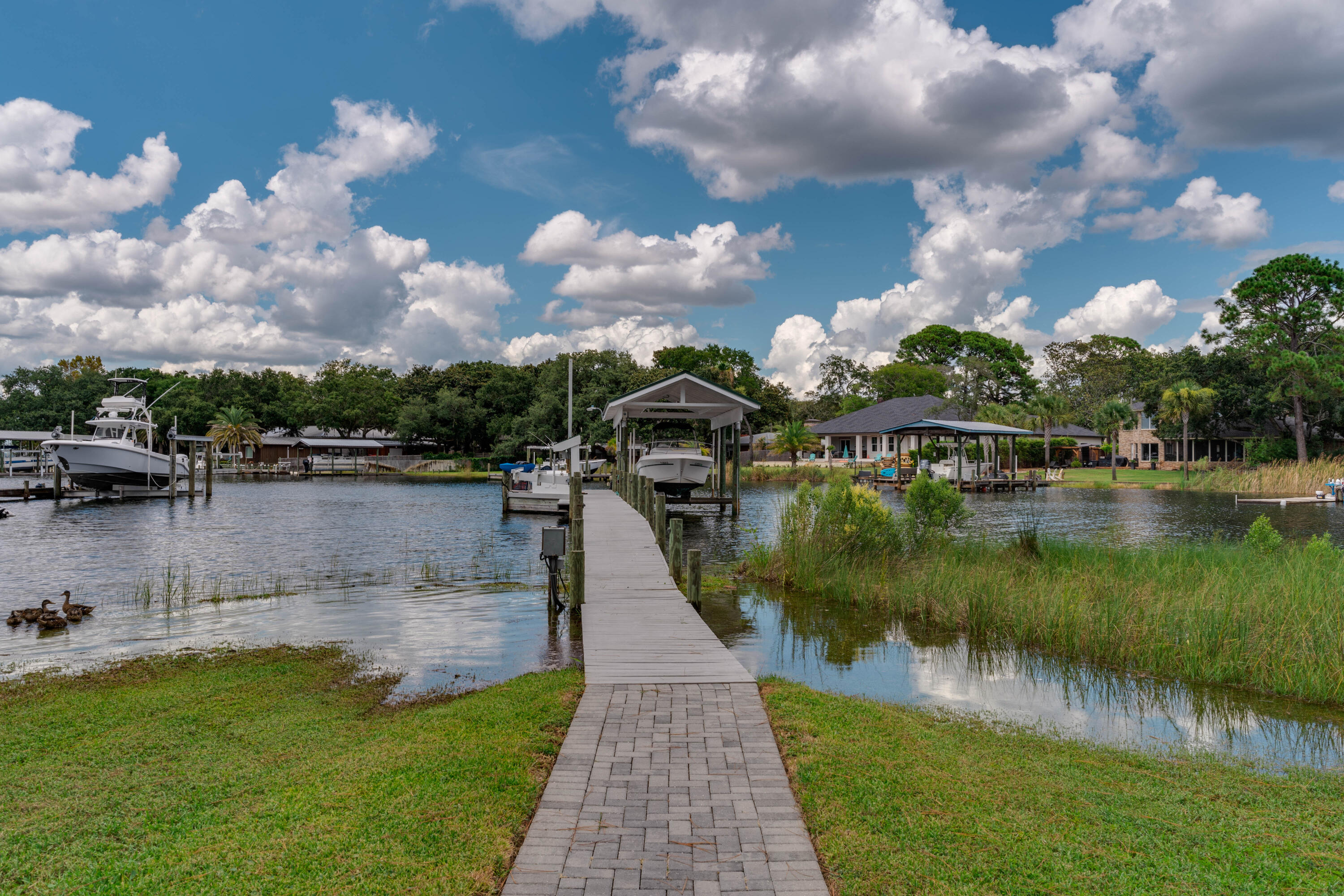 CALHOUN S/D DESTIN LOT 91 +BEG SW COR LOT 92 E 50 FT NW TO NE COR 91 THENCE S TO PT OF BEG BLK D 90 - Residential