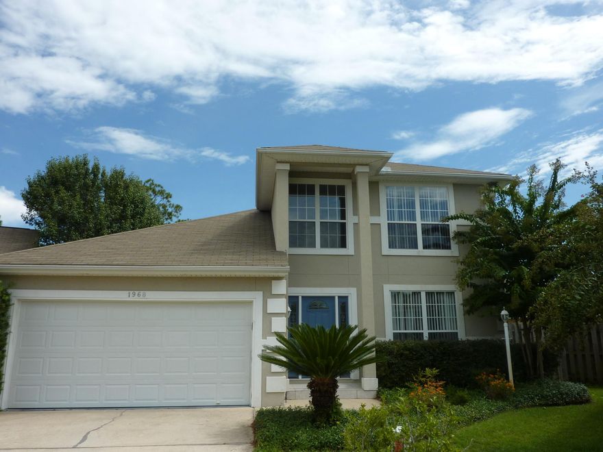BEAUTIFUL TWO STORY STUCCO HOME! LOCATED IN LOVELY, TROPICAL NEIGHBORHOOD. CONVENIENT TO ALL BASES! INCLUDES AN ENCLOSED, IN-GROUND, GUNITE POOL WITH COVERED LANAI! PERFECT FOR ENTERTAINING! INTERIOR FEATURES LARGE OPEN FLOOR PLAN WITH HARD WOOD FLOORING AND HIGH, RAISED CEILINGS! MASTER BEDROOM INCLUDES FRENCH DOORS THAT LEAD OUT INTO THE POOL AREA. WALK-IN CLOSET. LARGE DOUBLE VANITIES WITH HUGE GARDEN TUB AND SEPARATE SHOWER! TWO ADDITIONAL SPACIOUS ROOMS UPSTAIRS WITH EXTRA STORAGE SPACE. JACK AND JILL BATHROOM. AND MUCH, MUCH MORE!!
