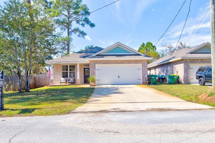 WELCOME HOME!! Beautiful, turn-key home with open floor plan located in the heart of Niceville. Cross the threshold into your entry way with views of the dining, kitchen, and large family room. The kitchen's warm cabinets, stainless steel appliances, granite countertops and sizable bar are perfect for entertaining. The family room features trey ceilings and opens to a covered patio in a fully fenced oasis. The enlarged patio is ideal for cooking out.  An expansive master bedroom features trey ceilings, large walk-in closet and ensuite with walk-in shower, double vanities, and linen closet. Three spacious bedrooms with generously sized closets are superb for kids or guests. A guest bath has double vanities and tub/shower combo. A large laundry and two car garage top off this desirable home.