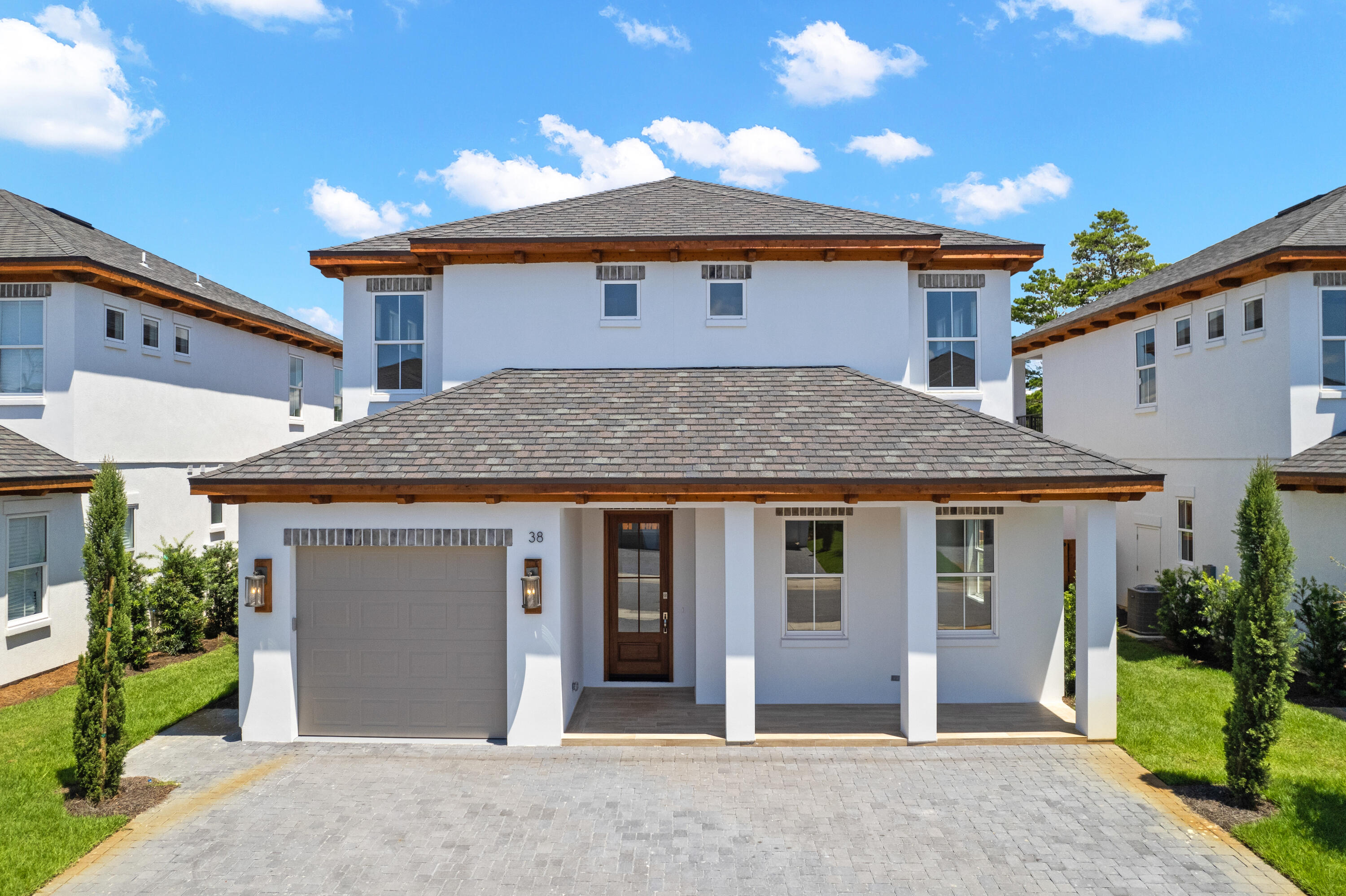Incredible new construction home just north of 30A! Furnished & turn-key! This 4-bedroom house boasts 2 master bedrooms (1 on each floor), 2 living areas and a separate sleeping space with custom built-in bunk beds. Once you enter the home you are welcomed with raised ceilings, shiplap walls and a resilient wood look tile flooring. As you progress through the open floor plan the kitchen is sure to catch your attention with a commercial grade 66in refrigerator/freezer, 6-burner gas cooking station and stainless-steel appliances. The first level master bathroom features a custom tile shower and standalone soaking tub. Upstairs you will find an additional oversized living area complete with beverage cooler, the 2nd master bedroom with access to the rear balcony, 2 guest bedrooms each with