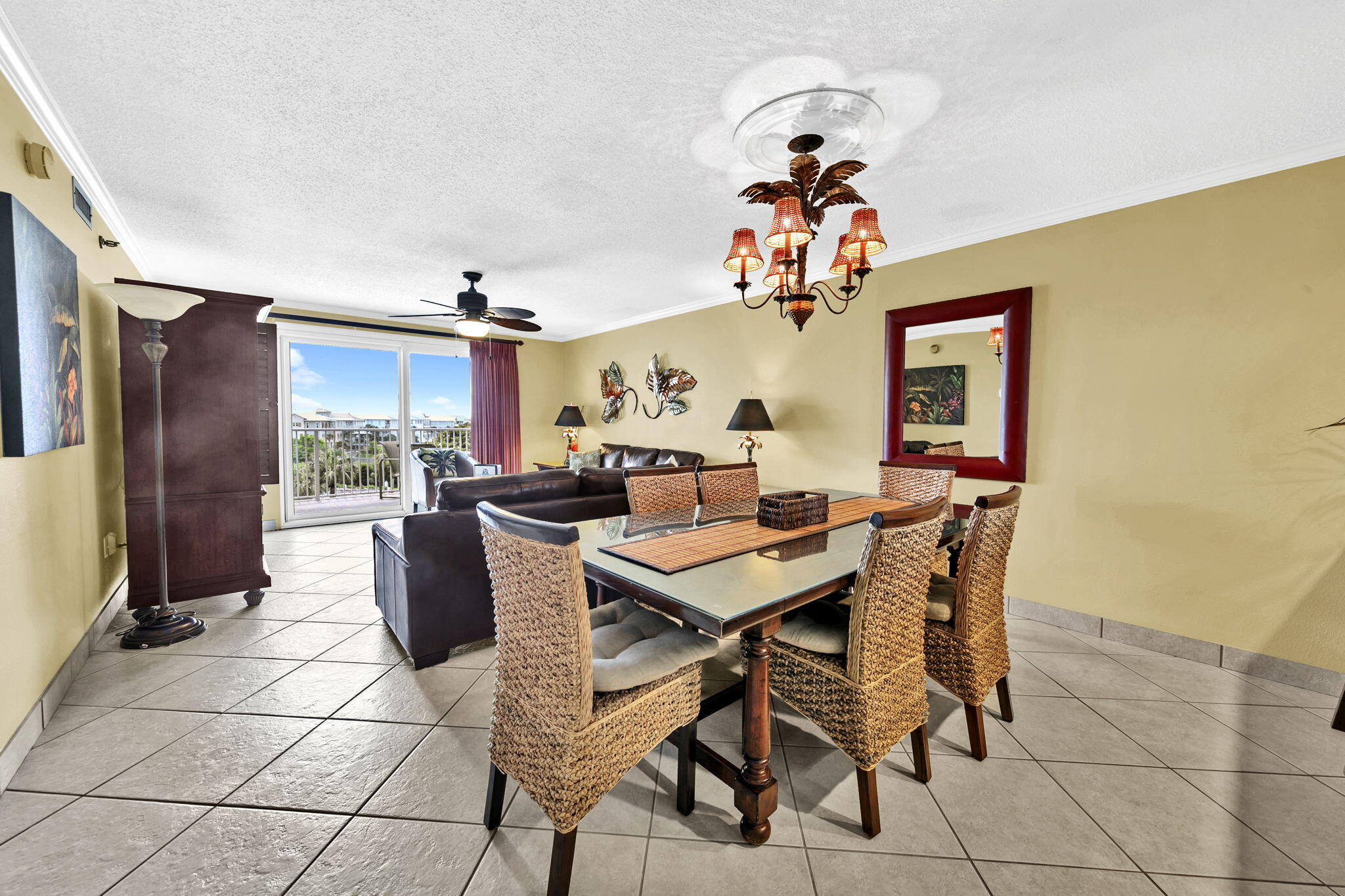 OWNER FINANCING BEING OFFERED,10% DOWN AND 5.5% INTEREST RATE! A gorgeous 2 bedroom and 2 bathroom condominium located at the popular Islander! Enjoy beautiful views of Lake Christina and the Destin Pass in which you can enjoy the most stunning sunsets from the balcony. This highly rated condo offers a spacious 987 sq ft of living space, comfortably accommodating up to 6 guests. It features a king-sized bed in the master bedroom, two twin beds in the guest room, and a sleeper sofa in the living room. The property has been professionally redecorated in a West Indies ''Tommy Bahama'' style, featuring tile floors, upgraded lighting, and much more. Conveniently located near Destin's attractions, Islander 413 is within walking distance to the beach and just a short drive to popular destinations such as Destin Harbor Boardwalk, HarborWalk Village, and Big Kahuna's Water and Adventure Park. This is the perfect investment opportunity as it is rental ready!