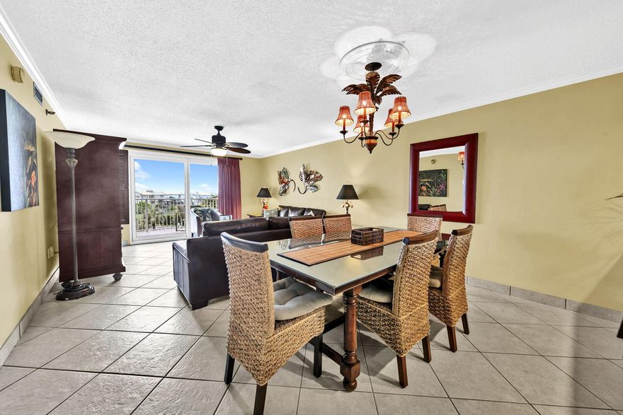 OWNER FINANCING BEING OFFERED,10% DOWN AND 5.5% INTEREST RATE! A gorgeous 2 bedroom and 2 bathroom condominium located at the popular Islander! Enjoy beautiful views of Lake Christina and the Destin Pass in which you can enjoy the most stunning sunsets from the balcony. This highly rated condo offers a spacious 987 sq ft of living space, comfortably accommodating up to 6 guests. It features a king-sized bed in the master bedroom, two twin beds in the guest room, and a sleeper sofa in the living room. The property has been professionally redecorated in a West Indies ''Tommy Bahama'' style, featuring tile floors, upgraded lighting, and much more. Conveniently located near Destin's attractions, Islander 413 is within walking distance to the beach and just a short drive to popular destinations such as Destin Harbor Boardwalk, HarborWalk Village, and Big Kahuna's Water and Adventure Park. This is the perfect investment opportunity as it is rental ready!

