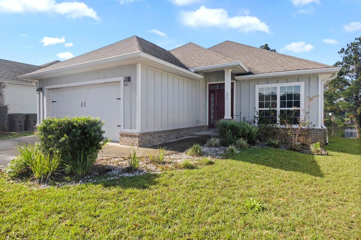 This beautiful home is located in the highly sought after LaGrange Landing community! This craftsman style home offers the open concept Hudson floor plan, with a huge deck overlooking the community pond -- perfect for entertaining! The kitchen features granite countertops as well as stainless steel appliances, and has plenty of space for storage and meal prepping! LaGrange Landing is a waterfront community which offers a community pool, plenty of fishing, a community path that leads to Lafayette Creek (which feeds into Choctawhatchee Bay) where paddle boarding and kayaking are enjoyed. This neighborhood is close to schools, shopping, restaurants and just a 35 minute drive to Eglin AFB and the sugar white sandy beaches of the Emerald Coast!