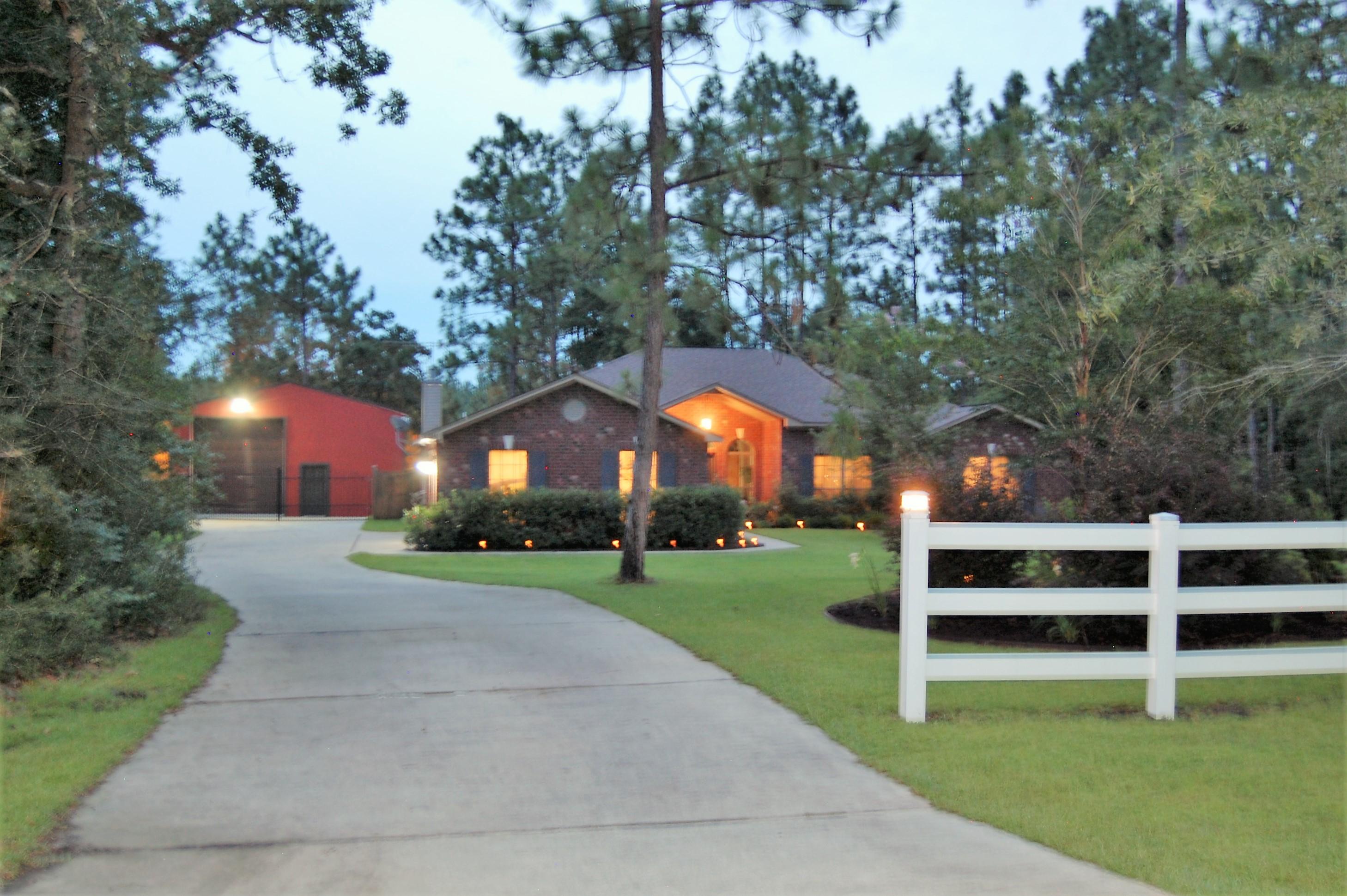 Fantastic home with an Enclosed Salt Water POOL, 30 x 40 Workshop with electric and on site private batting cages/ Basketball Court! Enjoy inside entertaining with 2 separate Living Rooms, a Formal Dining Room and a Corner Wood Burning Fireplace for cozy nights. Your open kitchen is a Chef's dream with tiled back splash, Stainless Steel appliances and built in microwave. There is a kitchen Island fit with storage cabinets and electrical outlet. Under cabinet lighting, walk in pantry and in-kitchen dining area complete this package! Then Escape to your Master Suite with tray ceilings, walk in closet with CUSTOM shelving and drawer system, double vanities and a Garden tub in the master bath and private access to Patio and Pool Enclosure. Bonus Private well and Beautifully landscaped yard!