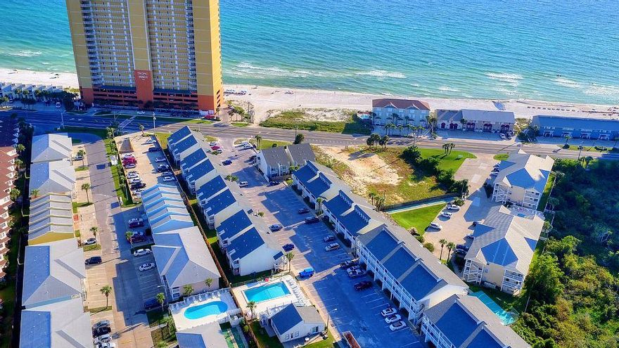 Across the street from the beach and the beautiful white sand of the Emerald Coast and just 10 minutes from Destin's 30A. Newly decorated with reds and golds, tropical decor, this one-bedroom condominium is large with mirrored walls in living room, crown molding throughout. Dining area and breakfast bar. Full kitchen with adorable red small appliances, built-in microwave (new in 2017), dishwasher (new in 2018) & frig w/icemaker. Washer and dryer in the unit. Large front balcony. Large master bedroom (king-size bed) with private balcony, large closet. Queen sized sleeper sofa in living room, and also has a bunk in the hallway. Association dues include cable, internet, water and insurance (except for contents), exterior upkeep. Outside A/C-Heating unit replaced 3 yrs ago.  New Refrigerator.