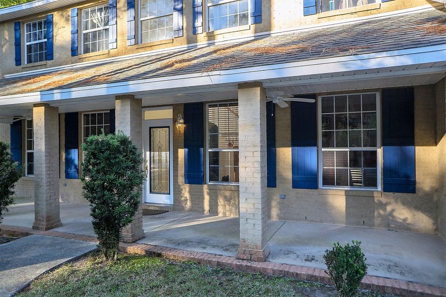 Bayshore Place with an ADDITIONAL bedroom and full bath above the garage, that's right there are five bedrooms and four baths here if you need it! This extra room is accessed through the garage and could be used as a man cave or even a mother-in-law suite. The first level boasts an Office/Den, Bedroom with full bath, large dining room as well as a family room with fireplace and spacious kitchen. The kitchen is a chef's dream featuring granite countertops with large island, cabinets galore, beautiful stainless steel appliances including built in ice maker, double wall oven/microwave as well as a natural gas stovetop. Upstairs you'll find the Master bedroom with large bathroom, two additional bedrooms and the main bath. Tankless water heater and dual zoning are some extra features. All this, situated on a beautiful treed lot with a completely fenced back yard. Don't forget the two covered porches for entertaining. Also, included is a home warranty to give you peace of mind. Check out the amazing 3D Virtual Tour.