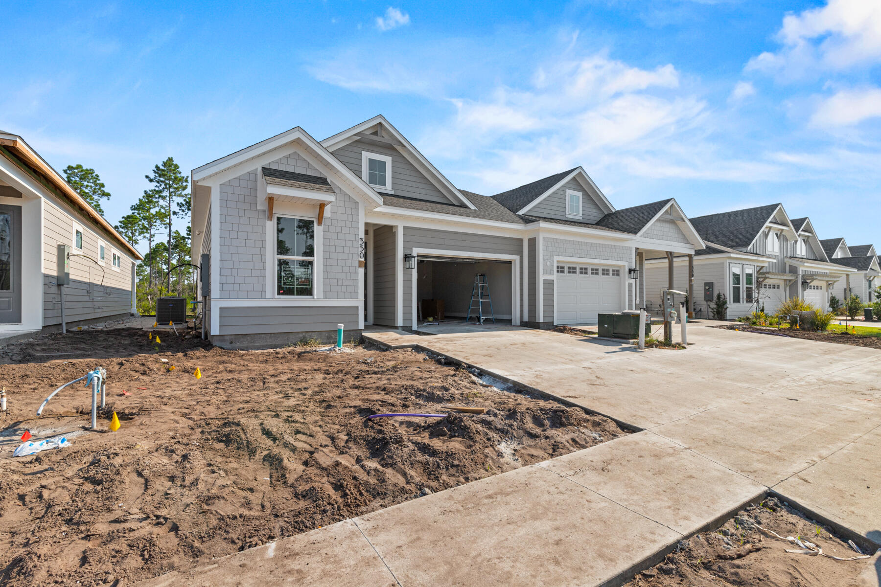 Welcome to The Villas at Longleaf Park, an exciting new addition to Watersound Origins, offering sophisticated paired villas by Fischer Homes! These attached single-family homes are designed to provide the ultimate in low-maintenance living -you can relax knowing that all lawn care and exterior home maintenance, including pressure washing and painting, are fully managed. Step outside to a beautifully manicured landscape and indulge in top-tier community amenities such as the Origins Golf Course, a resort-style pool at Village Commons, sports courts, and more.This ANFIELD plan showcases an array of luxurious features, including vinyl plank flooring, 10 ft ceilings, Powder Bath, Luxury Owner's Bath and more! See Designer selections (in Documents) chosen for this beautiful home!
Estimated completion is Nov. 2025.
Enjoy the ease of a low-maintenance lifestyle, HOA membership covers lawn care and exterior home upkeep, giving you more time to enjoy the exclusive amenities Watersound Origins has to offer such as the Origins Golf Course, a resort-style pool, sports courts, and more.
This is your opportunity to embrace easy living in a vibrant, amenity-rich community. Schedule a tour today!