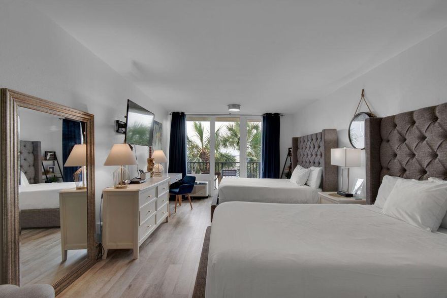 Peaceful views of the Choctawhatchee Bay instantly greet you as you step inside this well maintained studio condo. Located at Bayside in popular Sandestin Resort, this bayfront unit was updated in late 2020 with LVP flooring throughout, paint throughout, tile in the bathroom and tasteful furnishings. With just under $30,000 is gross rental revenue for 2021, this would make the ideal investment opportunity. This unit is being sold entirely furnished and features a relaxing bayfront balcony, two queen beds, a work area and a fully functional kitchenette equipped with a mini fridge, sink and microwave. Bayside is a bayfront condo building  conveniently located in close proximity to some of the most popular attractions in Sandestin including Sunset Bay Cafe, the Links Golf Course, the