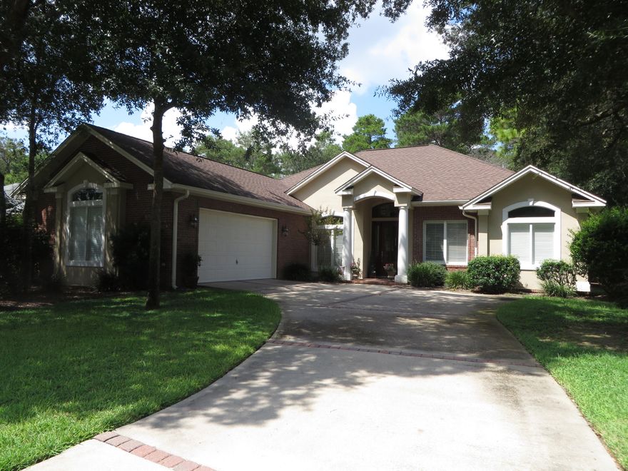 Welcome home to this exquisite custom built beauty in Swift Creek. Located on a quiet cul-de-sac and built by KGII. This one owner home will have you smiling as soon as you walk through the front door with it's 10, 11, and 12 foot ceilings, custom crown molding, and custom wood casted windows throughout. The gourmet kitchen features granite countertops, stainless appliances, dual fuel range, custom maple cabinets with pot drawers, breakfast bar and overlooks the Great room. The great room has 12' ceilings with custom built in niche surrounding the gas fireplace. Master suite offers two walk in closets, double trayed ceilings with double crown, and opens onto the covered back porch.