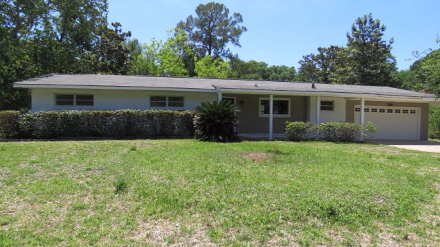 With a little love, this home would be the perfect home! The home features some laminate hardwood flooring living room and dining area, carpet in the bedrooms and tile in the kitchen and baths. There is a 2 car attached garage that will be great for storage or a workshop. The large backyard is fenced and will be great for entertaining family and friends. The location is convenient to Military Bases, shopping, schools and employment opportunities.