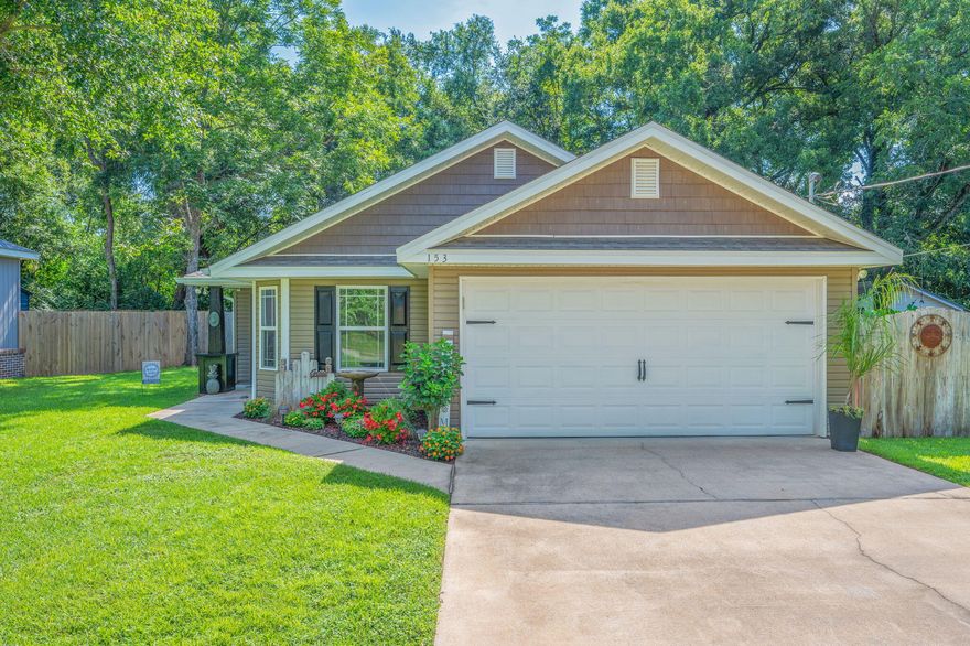 OPEN HOUSE SATURDAY 10/4 FROM 1-3 PM!! Fantastic Location!! Quality built 3 BD/2 BA home located on a beautiful picturesque lot in town yet tucked away on a quiet street. Welcoming front entry w/ wainscotting and spacious living room w/ cathedral ceiling. Kitchen features breakfast bar, stainless steel appliances and adjacent dining area w/ trey ceiling, lots of windows and natural light. Master suite also features a trey ceiling, walk-in closet and can accommodate all your large furnishings. The master bathroom has dual vanity and a beautiful large tiled shower w/ dual showerheads. Split bedroom design; indoor laundry room; 2 car garage. Irrigation system (on separate meter), covered rear porch and super cute backyard w/ privacy fence.