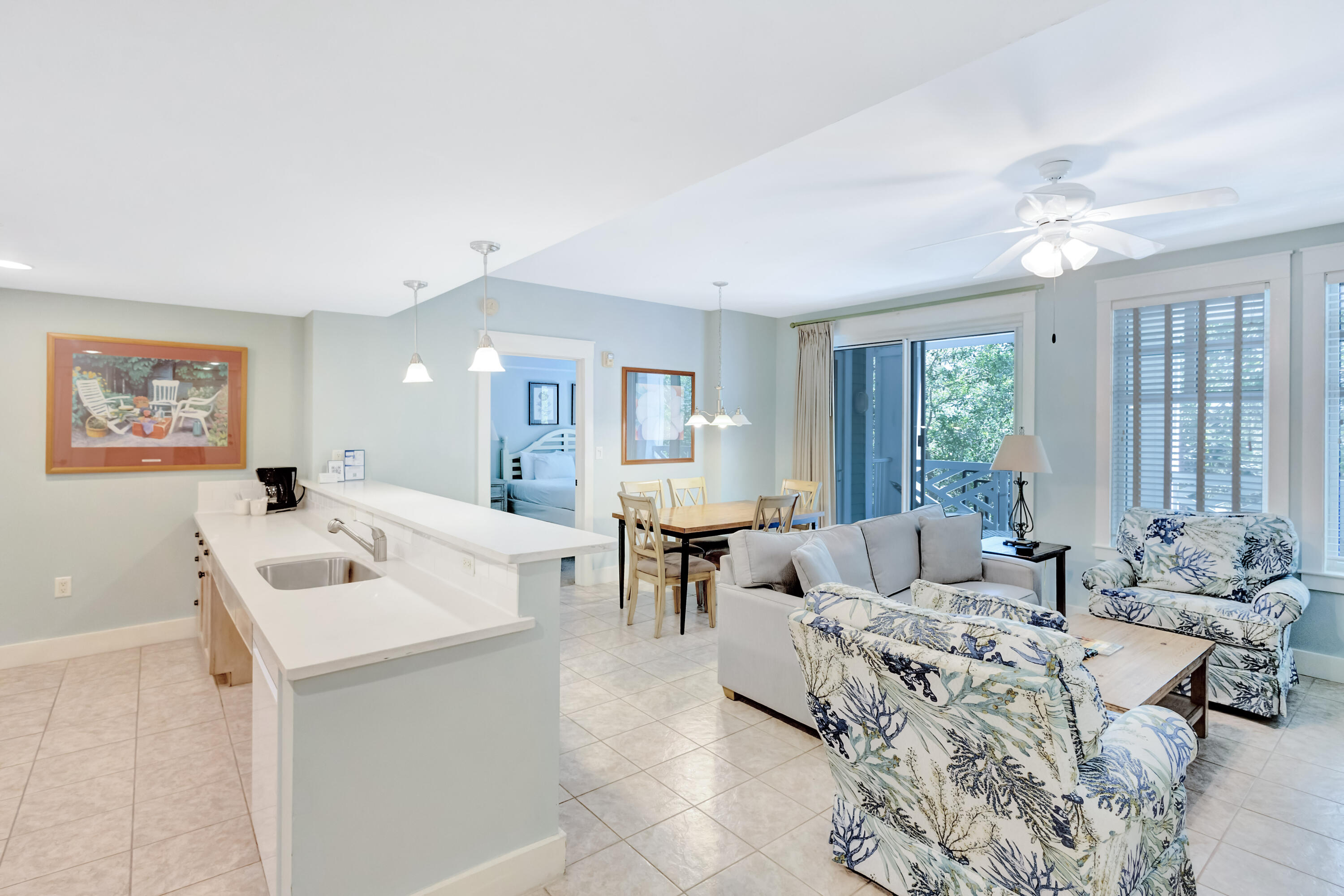 Discover the perfect blend of use, accessibility and location in this lock-off style residence in Pilot House. This floor plan affords you multiple ways to capture rental income (a studio with double queen beds, a 2bedroom or as a full 3bedroom). Conveniently located on the 3rd floor with direct egress to the amenity terrace hosting a resort style pool, grills, fitness center, gardens and fireplace pavilion. This condo is ADA-compliant featuring a roll-in shower, easily accessible sinks and safety handlebars. The living room has been refreshed with new furnishings, including a sleeper sofa, and the kitchen and baths have sleek white granite counters. Step outside to the spacious 27ft covered balcony, accessible from the primary & guest bedroom as well as the living area.
