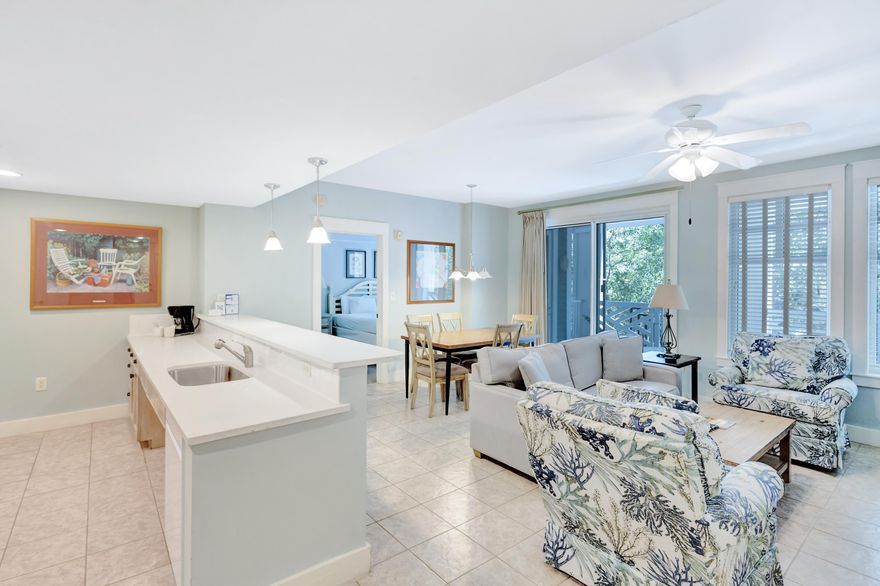 Discover the perfect blend of use, accessibility and location in this lock-off style residence in Pilot House. This floor plan affords you multiple ways to capture rental income (a studio with double queen beds, a 2bedroom or as a full 3bedroom). Conveniently located on the 3rd floor with direct egress to the amenity terrace hosting a resort style pool, grills, fitness center, gardens and fireplace pavilion. This condo is ADA-compliant featuring a roll-in shower, easily accessible sinks and safety handlebars. The living room has been refreshed with new furnishings, including a sleeper sofa, and the kitchen and baths have sleek white granite counters. Step outside to the spacious 27ft covered balcony, accessible from the primary & guest bedroom as well as the living area. Pilot House is part of the Gateway community integrated into the Village of Baytowne Wharf, a pedestrian village which hosts seasonal fireworks shows, dining, family friendly activities and playground, shopping, concerts and more.

As an introduction to the Sandestin lifestyle, we invite our new owners to explore amenities that make Sandestin special. The listing brokerage and seller(s) are presenting the buyer(s) of this property with (2) 90-minute rounds of Tennis court time, a golf foursome at one of our three championship courses, and a round of golf for up to four (4) players at the unrivaled Burnt Pine Golf Club.

Sandestin Golf and Beach Resort features more than seven miles of beaches and pristine bay front, four championship golf courses, 15 world-class tennis courts, a 226-slip marina, a fitness center, spa and celebrity chef dining. Shop, dine and play at the charming pedestrian village, The Village of Baytowne Wharf and more. Inside the gates of the resort, residents enjoy a balanced lifestyle of high-class living, spanning the 2,400 acres from the beach to the bay. Everything within the gates of the resort is accessible by golf cart or bicycle. The entire resort is interconnected by miles of pedestrian, bike and golf cart paths that weave through groves of live oaks, meandering past natural lagoons, fountains, man-made lakes, and meticulously landscaped fairways.