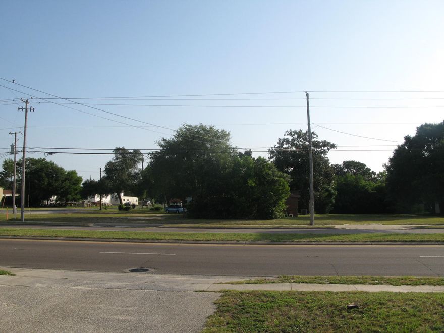 Property has old house given no value. Value is in the land. Level lot. Located near Publix and high school.