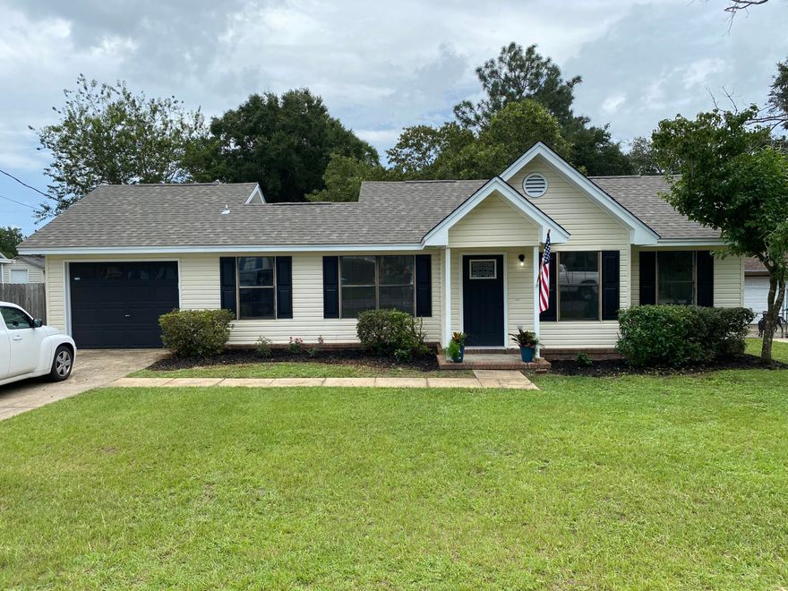 Absolutely charming; turn key, cozy home south of I-10. Complete renovation from top to bottom. New roof in June 2021, new HVAC system in June 2021, new cabinets featuring soft close doors and drawers, fresh paint throughout, new flooring, updated landscaping, THE WORKS!!. All that is missing is you. Wonderful back patio for entertaining friends and family. Perfect for BBQ and lounging. Prime location as it's minutes from shopping, I-10 and easy access to HWY 85 for getting to the bases. This house will be snapped up quickly so don't wait. Call/text and set up your showing appointment now before it's gone.