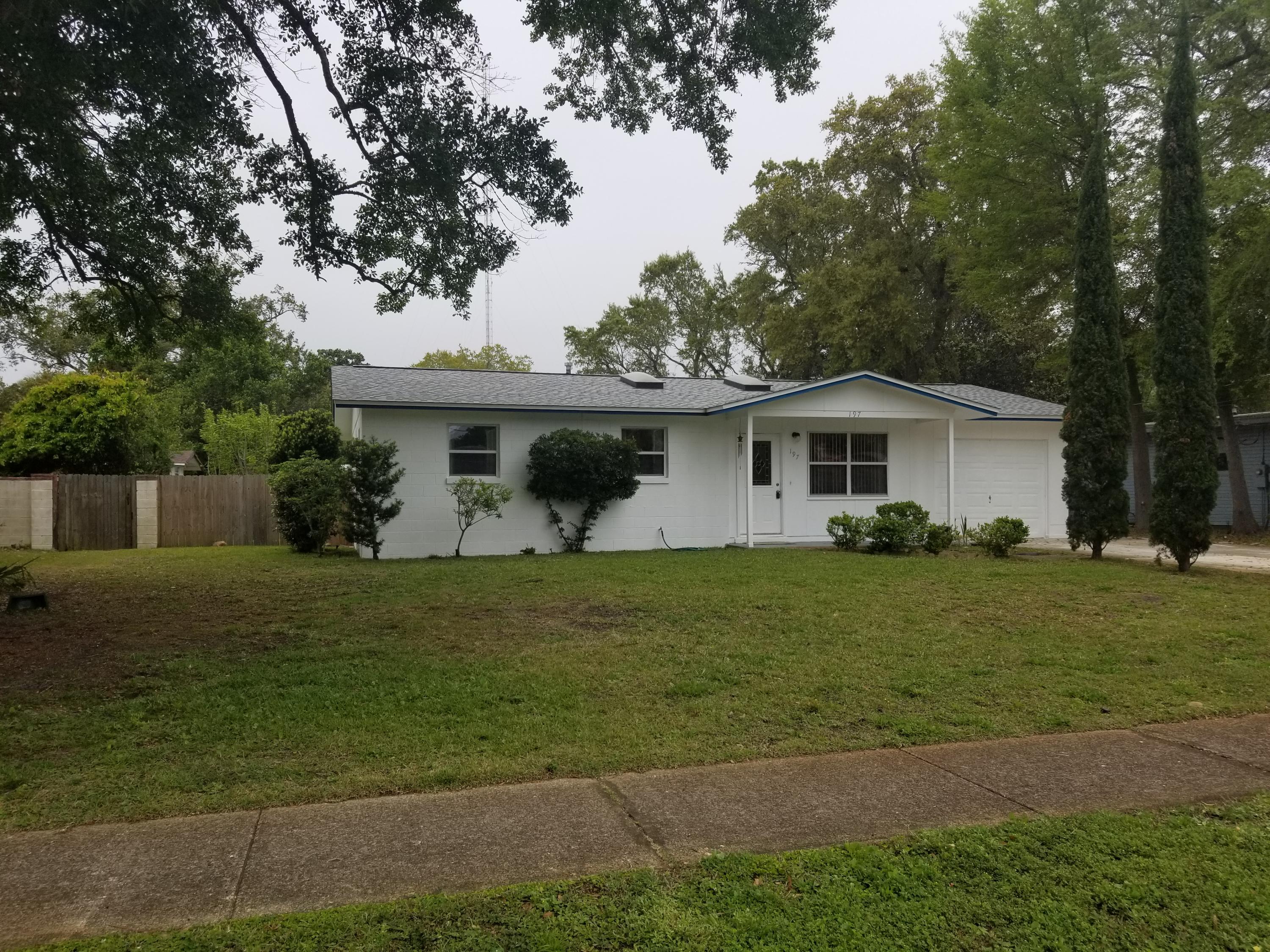 Your search is over! This 2 bedroom 1 bath beauty is a must see! Be greeted by stunning real wood floors which flow throughout. Living area sports recessed lighting and two large skylights. Bathroom has been updated with tile shower and nice vanity. Kitchen is large providing beautiful counter tops, a 5 burner gas stove and loads of cabinet space including a walk in pantry! Step out on your covered back deck perfect for grilling and entertaining. Large well manicured back yard with metal storage building which does convey. One car garage with automatic opener and large laundry area. This home has been lovingly maintained. Roof and skylights were replaced in 2017, AC is approximately 4 years old, electrical panel and hotwater heater are about a year old. Sprinkler system has a