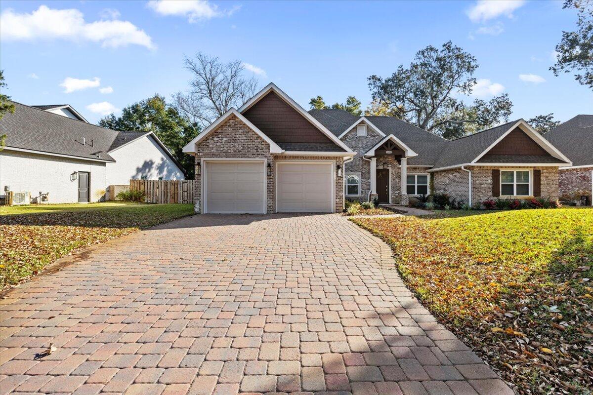 Discover unparalleled elegance and convenience in this custom built, open floor plan home, nestled within a highly sought-after gated community that is walking distance to the Sound and Boat ramp. Key features include 4 Bedrooms and 3 Full Bathrooms. Stunning Vaulted Beamed Ceilings in the Living Room. Gourmet Kitchen with a large Breakfast Bar, abundant cabinets and storage, and a walk-in panty with wooden shelves. Multiple dining areas include a separate Dining Room and a Breakfast Nook. Dedicated Office and a functional Laundry Room. The Primary Bedroom is situated away from the other bedrooms and boasts elegant step-up ceilings with crown molding. The Primary Bathroom features a beam ceiling, a large soaker tub, a tiled walk-in shower, two separate Quartz vanities, and a private water closet. The Second and Third Bedrooms have a Jack & Jill bathroom between them. The Fourth Bedroom has a bathroom just outside in the hall, which is perfect for Mom/Dad or guests. Enjoy your morning coffee on the large screened in porch. The backyard is completely fenced in. This Home has many upgrades throughout. Don't miss your chance to own this beautiful home.
Home is Virtually Staged.