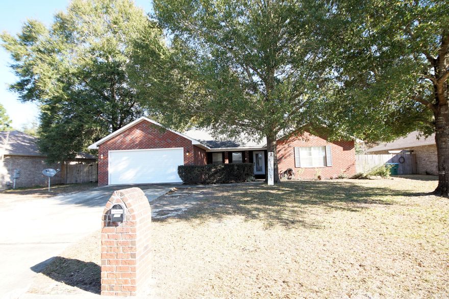 PRICED TO SELL!  Come see this lovely 4BR/2BA home with open floor plan that includes large living room, kitchen, breakfast nook, breakfast bar, and dining area all with laminate flooring! This home also has a master bedroom with tray ceiling, large master bath with double vanities, garden tub, separate shower, and walk in closet. Included as well are three additional bedrooms, a hall bath, and laundry room. The 2 car garage has opener, the level back yard is privacy fenced and has an open patio.
