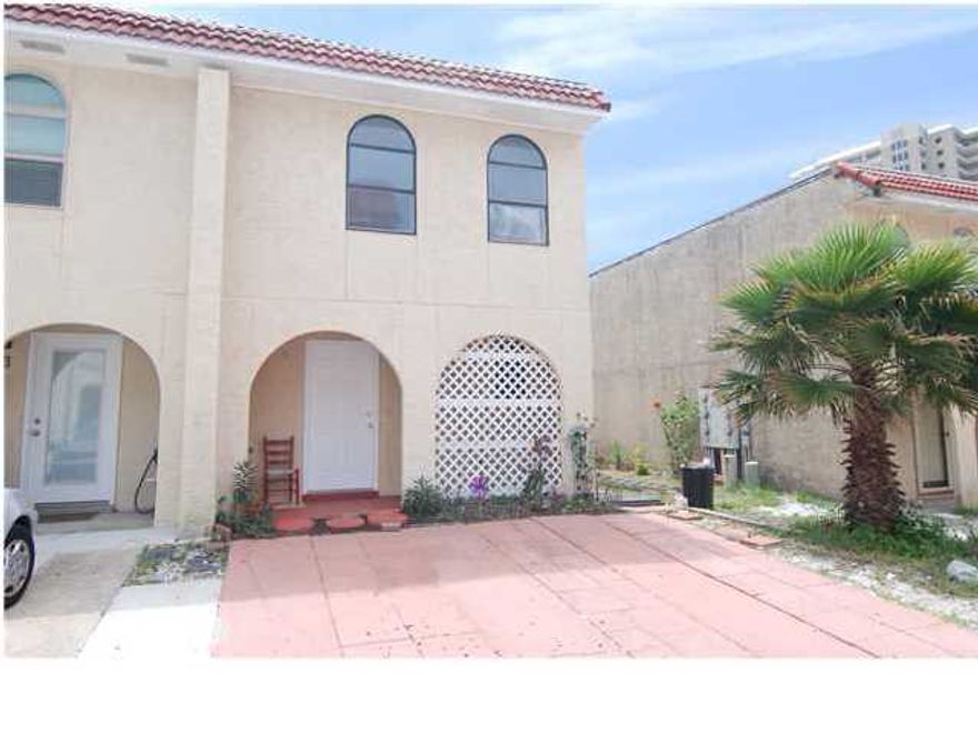 Wonderful opportunity to rent this 2BR 2.5BA town home close to the beach. Sugar white sand beaches await you and the beach access is right at the end of the street (approximately 500 ft. away). This town home is an end unit and would make a great place to rent, where you always feel like you are coming home to your own beach getaway! Fresh paint, new windows & new flooring on stairs & in bedrooms