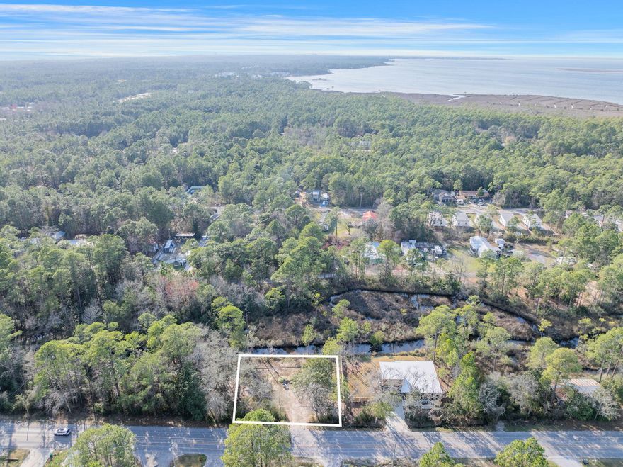 Discover the perfect opportunity to build your custom dream home on this stunning 0.34-acre waterfront lot in North Santa Rosa Beach. Boasting an impressive 146 feet of water frontage, this prime property offers breathtaking views, direct water access, and endless possibilities for boating, fishing, and enjoying the coastal lifestyle. Nestled in a serene and highly sought-after location, you'll be just minutes from the pristine 30A beaches, as well as top-rated dining, shopping, and outdoor adventures. Don't miss this rare chance to create your own slice of paradise!