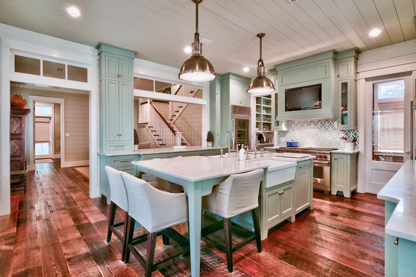 Stunning CUSTOM home in Watercolor. Interior Finishes and Furnishings selected by acclaimed designer Erika Powell of Urban Grace Interiors...Functional Architecture by Archiscapes and Quality construction by Baywoods Development combined to make this one of the finest homes built in Watercolor. Hand sewn wood flooring, reclaimed from a train station circa 1800's, flow throughout the main and guest homes. Painted tongue and groove wrap nearly every room in this coastal home. The first floor was designed with entertaining in mind. Open spaces surround a breathtaking kitchen. Subzero Refrigerator and Freezer, Wolf Range & butler's pantry. High end wood cabinetry topped with white marble. Dual farmhouse sinks are the kitchen's centerpiece. French doors give way to a wrap around porch, screened porch and outdoor grilling area. A spacious living area with brick fireplace, dining room, 1 bedroom with private bath, guest bath, laundry and office areas are also on the first level. Upstairs you will be greeted by whimsical bunk beds, barn doors and a laundry room sure to make you smile. With it's heavenly Master Suite and Master Bath, expansive porches and sleeping porch...The second floor is as impressive as the first. 2 guest bedrooms and bathrooms, a cozy den with wet bar and a light filled reading room complete this second level. Take a break in the game room as you make your way up to 4th floor where you'll enjoy 360 views of Watercolor from the the large tower room and widow's walk. A Beautiful Guest house with a full kitchen, living room, private bedroom and a bathroom is located above the 2 car garage. Large private lot has room for a pool. Home has been meticulously maintained. Other upgrades include an indoor fire suppression/sprinkler system and an alarm system for added safety and reduced insurance premiums. Sold furnished with some exclusions.
