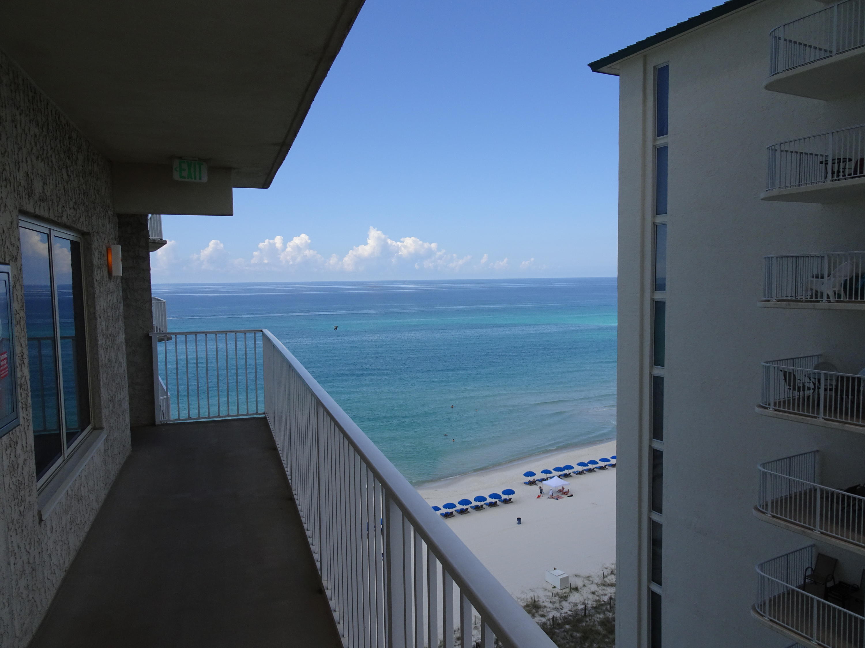 MOTIVATED SELLER! BUYERS WELCOME! BRING OFFER! Lowest priced Type B plan available! FULLY FURNISHED! 2 Bedroom with bunk and 3 Bathrooms. This condo is the most desired plan in The Shores of Panama with unobstructed views of the Gulf of Mexico from the front balcony and front door (which is rare). This is the highest grossing condo in the Type B plan with approximately $30,000 in rental income in 2015 and projected to do the same in 2016. Beautifully decorated with inspiring beach themes which invigorate the senses, perfection is the only way to describe this masterpiece. An open floor plan with a gourmet kitchen and oversized cabinet and closet space is perfect for family vacations.