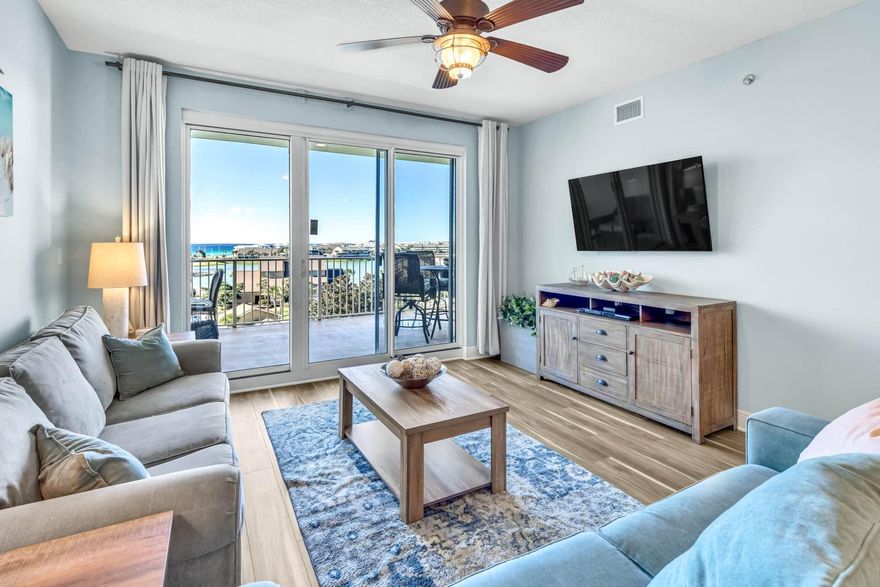 Beautifully updated Aerial Dunes condo features fantastic views of the gulf and overlooks the pools and lake! It comes fully furnished so it's move in ready or will make a turnkey vacation rental. Inside discover tasteful decor, great kitchen area with granite & stainless appliances, and massive balcony to enjoy morning coffee or a stunning sunset. Updates in the last 2 years include all new vinyl flooring throughout the unit and painting of the kitchen cabinetry. It also comes with an exterior storage closet. You'll enjoy Seascape resort amenities like deeded beach access, use of multiple pool areas, Pickleball courts, gym, and gorgeous common lobby area. The location is convenient to Seascape Towne Center, abundant restaurant & entertainment venues, and outlet shopping. Agent has equity