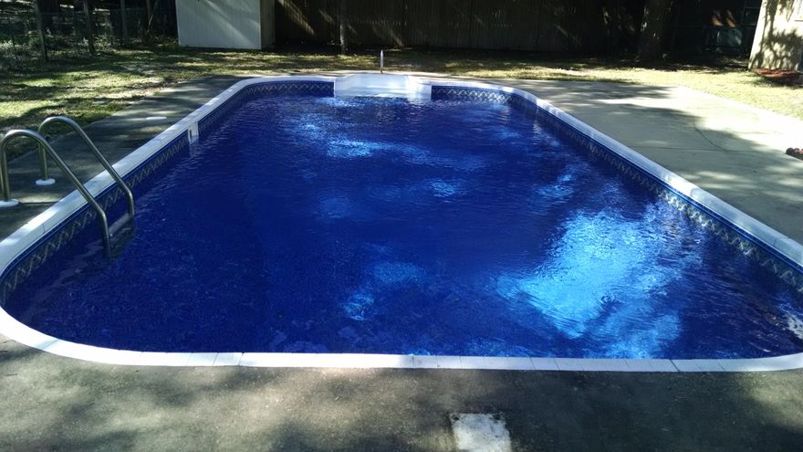 Beautiful pool with new liner, steps and sand filter! Screened porch (26X15) on the rear of the home has privacy screen over looking the pool. French doors lead to the large family room (19X18). Plenty of room for big screened TV with an electric fireplace. Home also has a living room/ dining room combo so two good sized living spaces. Kitchen has plenty of cabinet and counter space for the serious cook and is open to the dining area. Large laundry room with storage. Convenient location. Five minutes to Lowes and Walmart and 10 minutes to beaches. Neigborhood park close by. Public boat launch on Pocahontas Drive one street over. Make this one yours today!