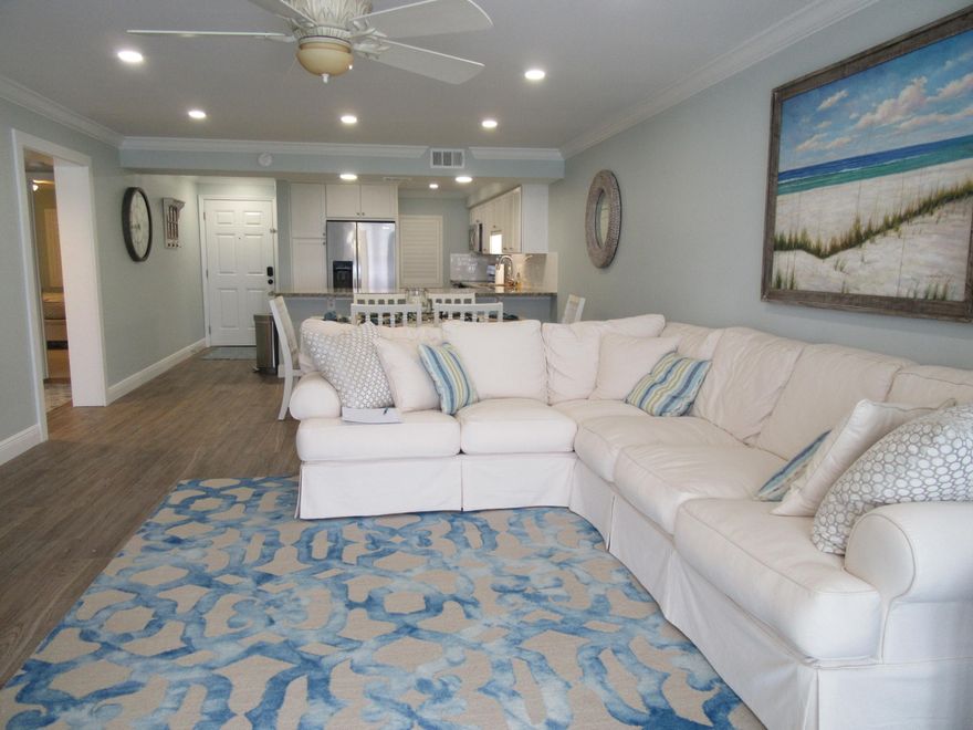 TOTAL REMODELED GULF FRONT! Over $95k in renovations , NEW furnishings, NEW stainless appliances. Enjoy the stunning views of the Gulf from the living area as well as the master bedroom. The unit is very tastefully decorated. Lots of cabinet space in the kitchen along with granite countertops. Ceramic floors throughout with carpet in the bedrooms(all new). Quartz in master bath. New state of the art lighting in NEW ceiling A MUST SEE!