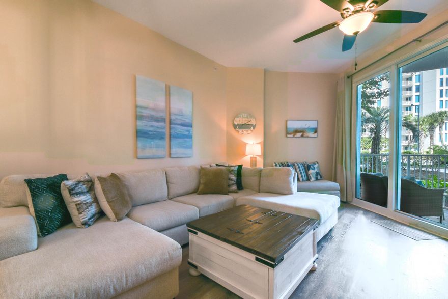 No elevators needed for this ground floor unit, many updates to this unit. Mostly all new furniture, new washer and dryer, new compressor in A/C unit , new counter tops in both Bathrooms to mention a few. The ground floor units have the higher ceilings and this unit is minutes from the large lagoon pool and hot tub with children splash pad and heated pool. The Palms has onsite restaurant and coffee shop, fitness center and pickleball, tennis courts, basketball, a lot of things todo to keep you busy. Just across the street from the beautiful white sandy beach. Complimentary beach shuttle service to and from the beach and shopping!!