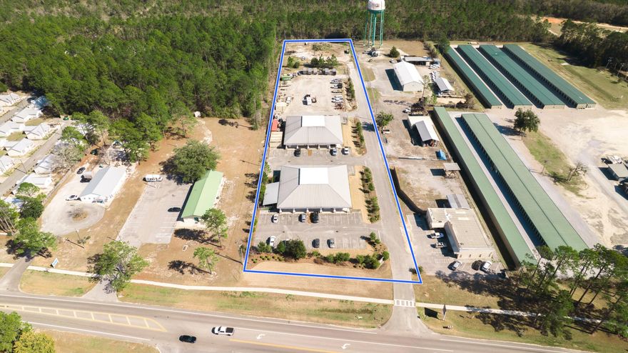 Now offered for lease, please consider this premier office and warehouse campus situated on +/-3.87 acres at 15167 Highway 331 Business in Freeport, Walton County, Florida! Zoned C-1: General Commercial within the City of Freeport, the property offers flexibility for corporate headquarters, professional office users, contractors, logistics operations, and service-based businesses. The site includes two freestanding buildings totaling ??14,973 SF of gross building area. Building 1 consists of ??8,589 SF of fully finished professional office space across two floors (??6,384 SF first floor / ??2,205 SF second floor). The building features multiple private offices, three large conference rooms, two break rooms, dual reception areas, restrooms, and storage areas. The layout can accommodate a single corporate user or multiple tenants with current configurations. 

Building 2, designed to support either two tenants or a single occupant, includes ??6,384 SF of flex/warehouse space with ??400 SF of office, shared breakroom and restrooms, and four passthrough grade-level overhead doors, including two 9' x 11' rear doors and two 9' x 9' front doors. The warehouse offers approximately 17' eave heights and up to 28' clear height at the center peak, providing excellent vertical capacity for storage, racking, or equipment.

Offering highlights include ??2.11 acres of excess land, 65+ surface parking spaces, ??204' of highway frontage, smart secure entry systems, on-site security camera monitoring, and full utility infrastructure in place.

This offering presents a rare opportunity to lease high-quality office and warehouse space with scalable capacity and long-term flexibility in one of Freeport's most active commercial growth corridors.