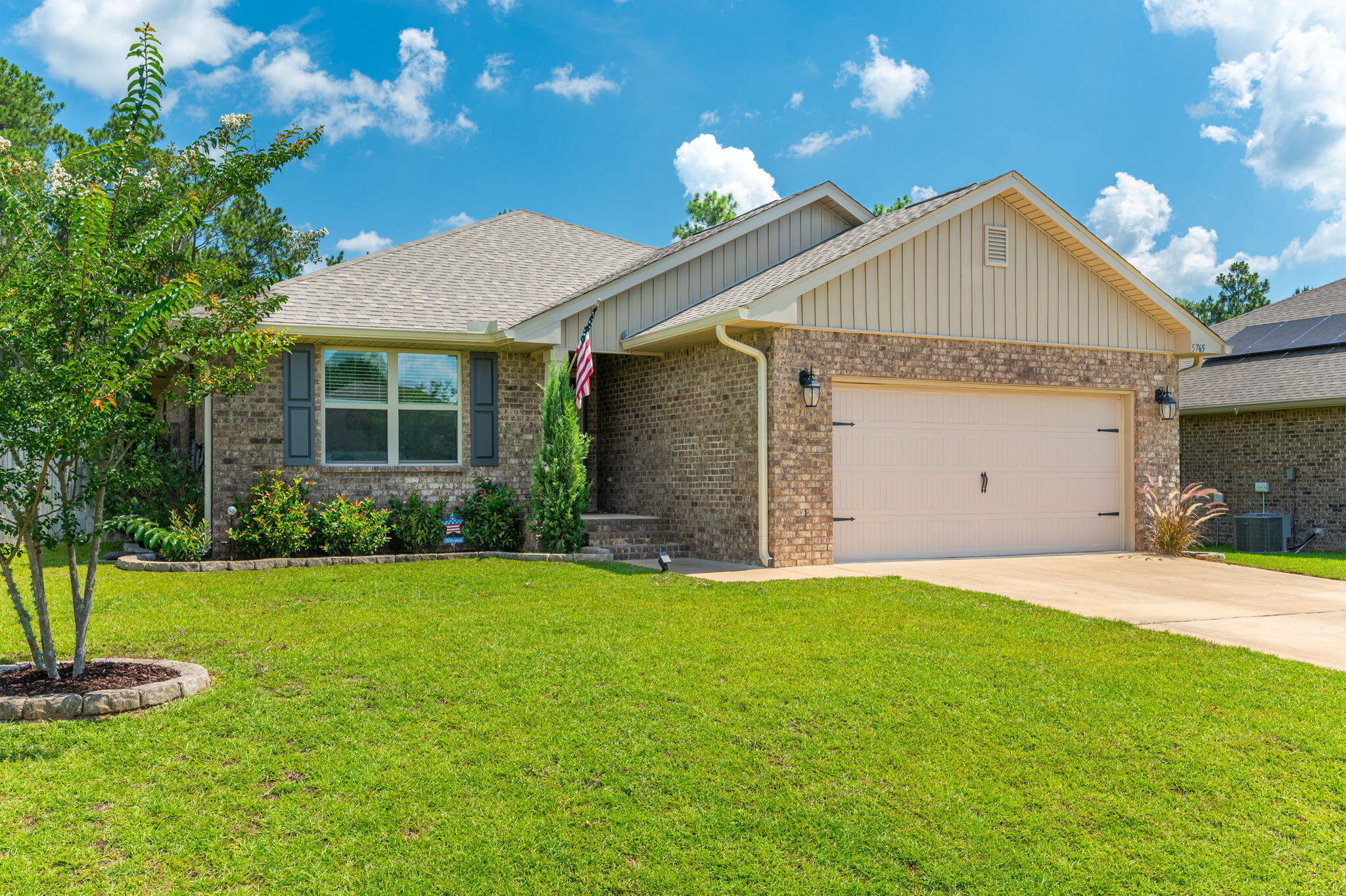 Welcome to where comfort meets convenience , Crestview's sought-after Willow Creek Plantation II, a community with access to a Saltwater Pool and Playground! This well-maintained home features 4-sided brick construction, a fully sodded yard with irrigation, and a spacious two-car garage with pulldown attic stairs for added storage. Inside, enjoy upgraded Coretec laminate flooring, granite countertops, white cabinetry, a breakfast bar, and a new refrigerator. The split floor plan offers a spacious master suite with a trey ceiling, double vanity, walk-in closet, garden tub, separate shower, and private access to the covered back patio--perfect for relaxing evenings. Additional features include storm doors (front and back), gutters, recessed lighting, 2'' faux wood blinds, fresh neutral paint and charming Craftsman-style curb appeal. Situated on a generous 0.32-acre lot and just minutes from shopping, schools, and local bases.