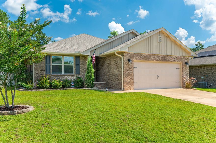 Welcome to where comfort meets convenience , Crestview's sought-after Willow Creek Plantation II, a community with access to a Saltwater Pool and Playground! This well-maintained home features 4-sided brick construction, a fully sodded yard with irrigation, and a spacious two-car garage with pulldown attic stairs for added storage. Inside, enjoy upgraded Coretec laminate flooring, granite countertops, white cabinetry, a breakfast bar, and a new refrigerator. The split floor plan offers a spacious master suite with a trey ceiling, double vanity, walk-in closet, garden tub, separate shower, and private access to the covered back patio--perfect for relaxing evenings. Additional features include storm doors (front and back), gutters, recessed  lighting, 2'' faux wood blinds, fresh neutral paint and charming Craftsman-style curb appeal. Situated on a generous 0.32-acre lot and just minutes from shopping, schools, and local bases.