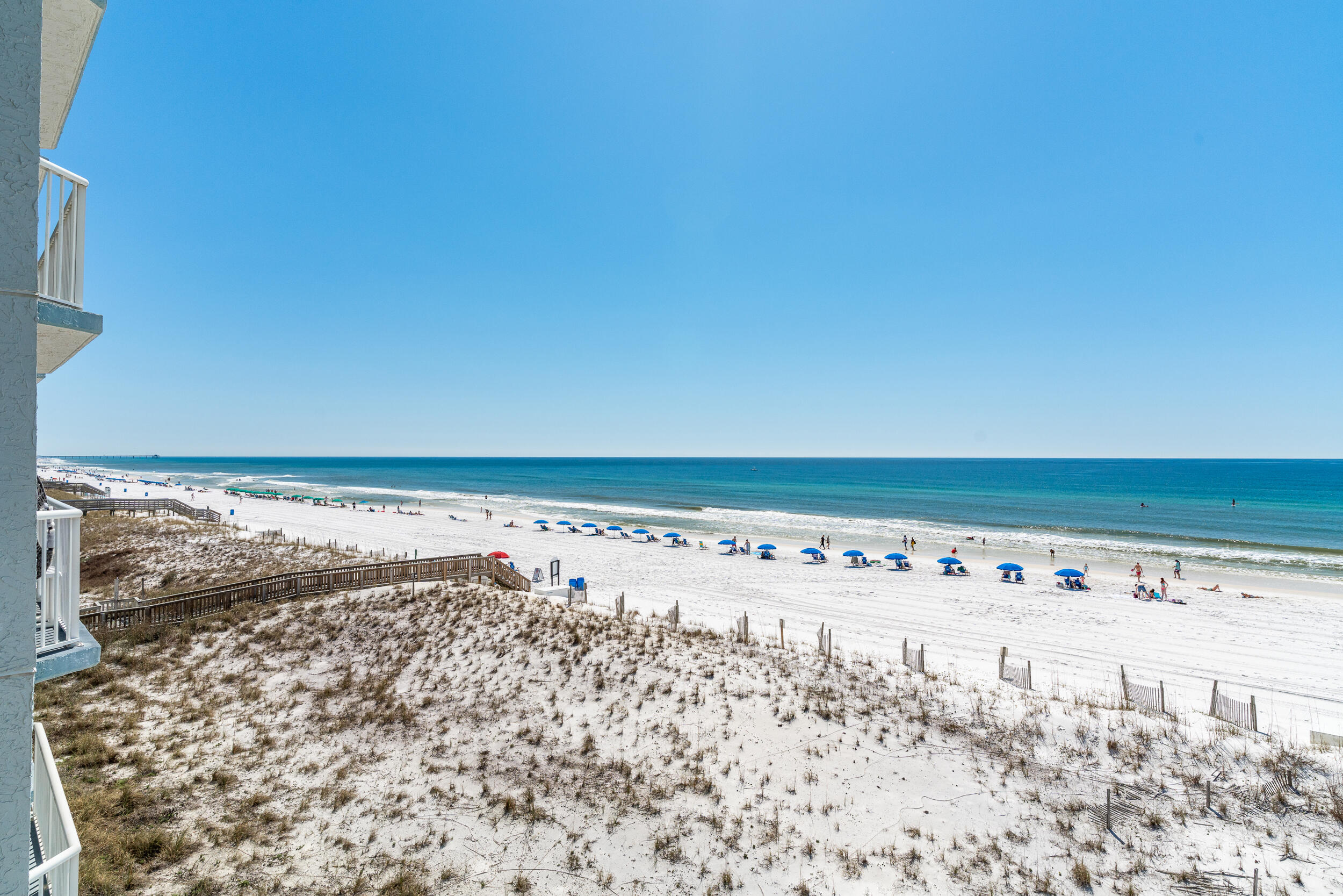 Furnished Beachfront Efficiency Condo on 4th floor with views of white sand beaches and the gorgeous gulf waters. Investment potential. Kitchen enjoys a table for 4, dishwasher, stove, microwave & refrigerator. Full bathroom with tub/shower combo. Unit sleeps 4 with a Queen size bed & pull out couch. Custom drapery and blackout shades. Step out on your balcony through your sliding door and enjoy the sounds of the crashing waves & the sparkle of the emerald seas. The community enjoys Deeded Beach Access with Beach Service during the season. Plenty of parking w/ Covered gated parking for owners - unassigned, large parking lot, 80' heated beachside pool, hot tub, BBQ grills, fitness room with new equipment & updated event space.