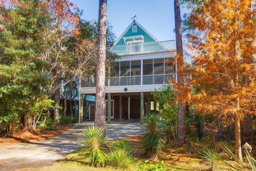 This perfect beach house is nestled among many huge trees with so much expansion potential. Living across from the state park with the wooded areas you have wildlife that stroll into the yard in the evenings...and the beach is only two blocks away! No worry about customary use as this is your state park to use! Oversized screened- in porch off the living room could be enclosed to make an even larger family room. Backyard is large enough for a pool, carriage house or both! This house was built by Benoit Laurent on oversized pilings with durability and expansion in mind. There is a workshop/storage room under the house and also a screened in area for the grandkids. Original owners still live here and have kept the house in immaculate condition. Exterior siding is Western Cedar: painted last