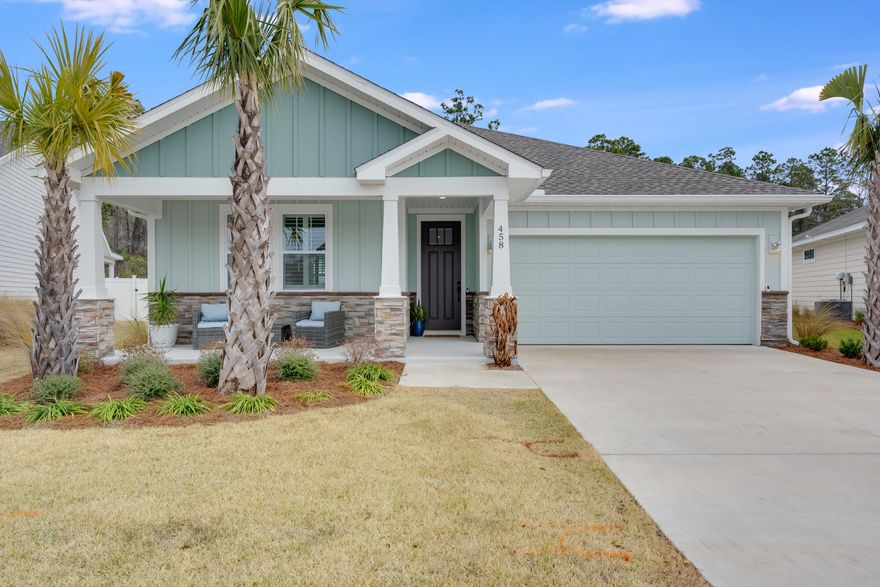 Turn-key and perfectly located, this beautifully maintained single-story home offers a blend of comfort and convenience. With a natural wooded backdrop providing privacy, this home is move-in ready and designed for easy living. The open floor plan features spacious bedrooms, a bright living area, and a modern kitchen with quartz countertops, stainless steel appliances, and ample storage. The private primary suite includes a walk-in shower and generous closet space. Enjoy the outdoors with a covered patio and peaceful views. Just six minutes to the beach and fifteen minutes to Pier Park, this home offers the best of coastal living with shopping, dining, and entertainment nearby. Call your favorite Realtor to schedule a private showing!