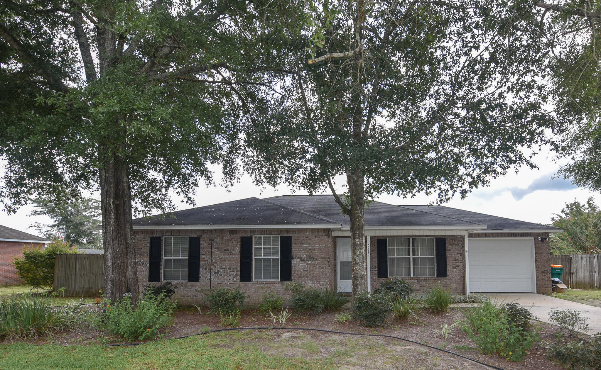 Great North Crestview property minutes away from downtown Crestview, with a quiet country feel. This cozy all brick 3bed 2bath home welcomes you with cathedral ceilings, open living area floor plan, covered patio and to top it off a HUGE back yard!