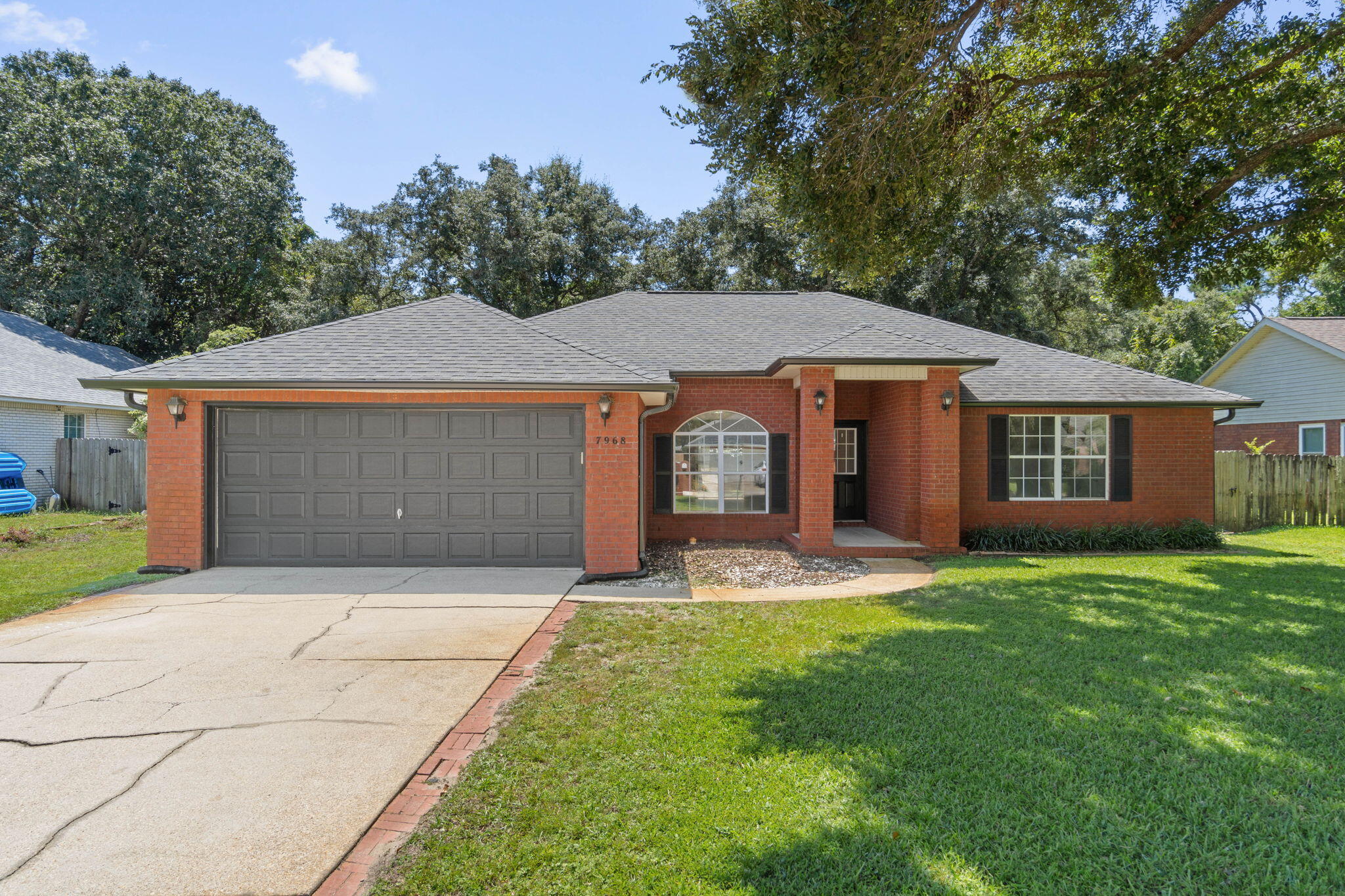 Outlined by the serene beauty of Navarre, FL, 7968 Lola Circle is a radiant oasis awaiting your arrival. This exquisite 4-bedroom, 2-bathroom home spans a generous 1,773 sq ft, offering ample space for comfort and tranquility.With its inviting charm and convenient layout, 7968 Lola Circle is more than just a house--it's a place to create lasting memories. Enjoy direct access to the community fishing pier just steps from your backyard--perfect for waterfront relaxation, fishing, or soaking in serene water views. The perfect blend of comfort and style in this exceptional rental opportunity.