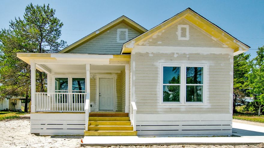 Beautiful home in Sand Dollar Estates on the popular West End and an easy ride to the beach! This 3 Bedroom and 2 Bath has floors throughout with Cortec waterproof plank with cork backing. Appliances include dishwasher, refrigerator w/ ice & water in door, electric range & microwave /vent above range. The master bedroom has a walk-in closet and the master bath includes a separate shower and garden tub. Amazing fenced in back yard with irrigation well and sprinkler, sodded yard and landscaping! 10X10 storage building in the back yard. This is a must see for your buyers. The photos are from when the house was being finished. House is completely done and we will have updated photos soon.