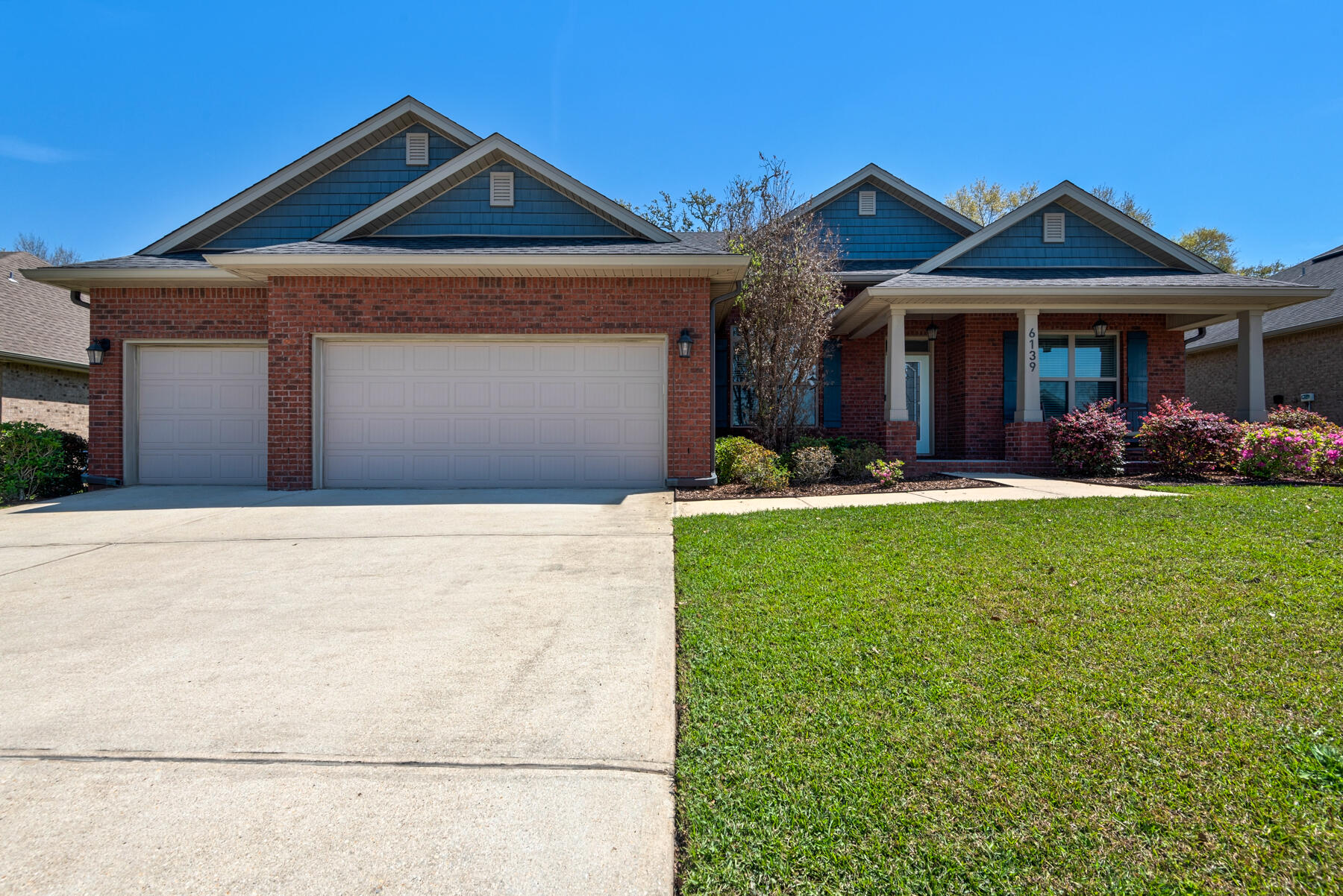 Immaculately maintained and move-in ready! This beautiful 2017-built, 2,460 sq ft home offers a spacious and functional split bedroom floorplan with 4 bedrooms and 3 bathrooms, open-concept living/kitchen area, high ceilings, large screened porch, privacy-fenced back yard, 3-car garage, and Tesla charging station. This great neighborhood is conveniently located near I-10, NFCU, and the new Publix shopping center. Call today to schedule your showing!