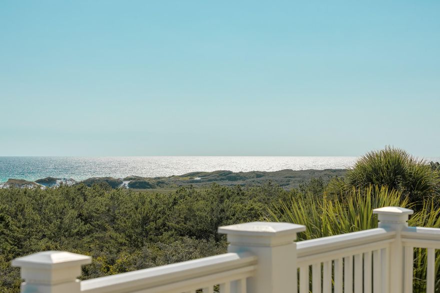 Gulf views in the gated community of Cypress Dunes rarely come available so don't miss your opportunity to own this one. This front row home sits at one of the highest elevations in the community. Bordering Topsail Beach State Park this home enjoys unobstructed views of the Gulf. Featuring 5 bedrooms and 5 baths there is plenty of room for family and guests. 2 bedrooms with en-suite baths are located on each of the first 2 levels with the Master suite encompassing the entire 3rd level. Enjoy morning coffee and incredible Gulf views off your master bedroom private terrace. White washed wood floors and freshly painted white walls provide the perfect beach vibe. Kitchen has been refreshed with white cabinets, quartz counter tops and Thermidor appliances. Cypress Dunes is a fully gated