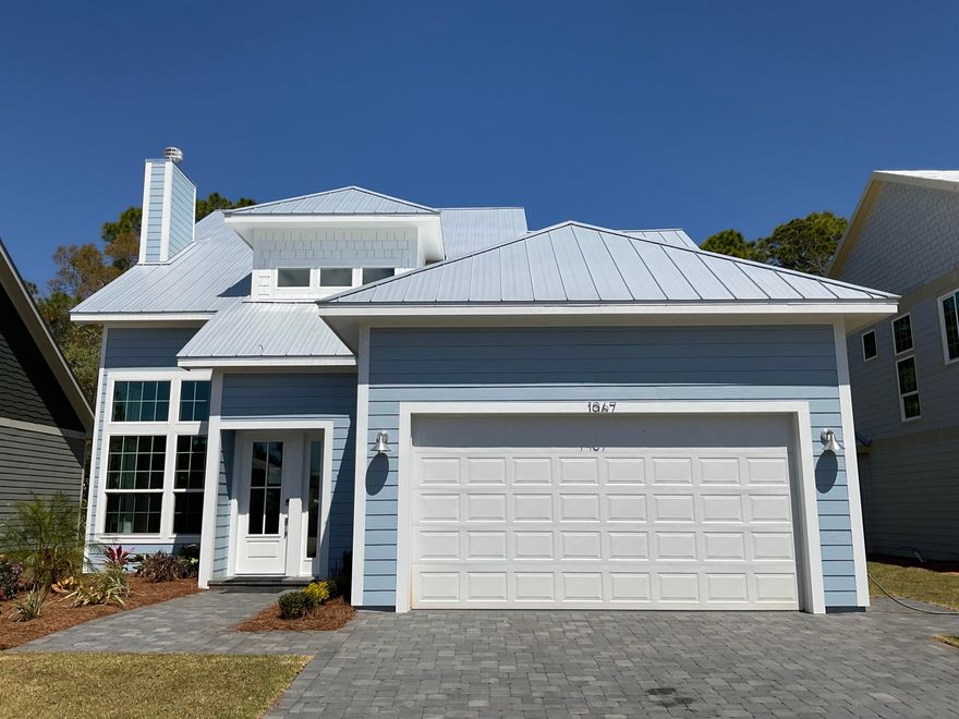 *Temp withdrawn for new photos* Introducing one of eleven upscale, dockside homes with direct canal access to Hogstown Bayou and the Choctawhatchee Bay! This newly completed craftsman-style residence offers 4 bedrooms, 2 1/2 baths, beautiful craftsmanship, tasteful accents, and your own private dock on the canal, already prepped with power and water. Ideally located, you can choose to enjoy this peaceful home with dock fishing, boating, or just relaxing - OR choose fun activities and white sandy beaches. Only minutes from the 30A Beaches or Sandestin's Grand Boulevard; shopping, restaurants, recreation, and entertainment are a short drive away. Immediately upon entering the home, you are welcomed by warm wood composite flooring throughout the main level. The soaring ceiling in the livi area adds to the openness of this gathering space, complete with a wood-burning fireplace and windows everywhere! This amazing kitchen has everything you need with plenty of room for cooking and entertaining. The quartz countertops, custom cabinets, and stainless appliances flow gracefully together in this inviting space. The peaceful views of the canal from the dining area and the access to the paver patio outside invite you to relax with a good book or good conversation with friends. There's a powder room just off the kitchen and continuing around the corner, you will find the primary bedroom suite. With a cathedral ceiling, two closets in the bedroom and stunning views, you will feel at home in here. The en-suite includes double vanities, a roomy walk-in closet, a separate rain shower, and a private room with beautiful tub and toilet.   The warm wood composite flooring continues from the main level up the stairs, leading to three generous bedrooms branching off from the second level landing. This home will appeal to both full-time residents and those seeking a second home in this remarkable community.
