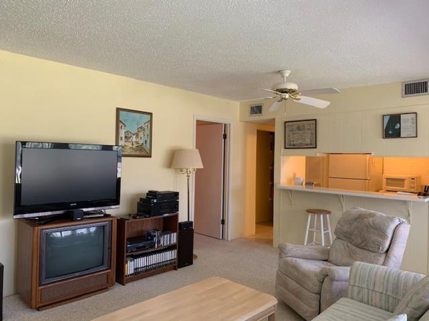 Outstanding One bedroom Condo, Easy access first floor. In Pristine condition. New A/C 2019. All appliances convey. Includes Washer & Dryer. Porch enclosed, giving the unit more interior square footage. Amenities Include: Pools, Community Room, Barbecue Grills, Tennis Court, Close to Beaches, Shopping & entertainment. Buyer to verify any and all dimensions. Ma. fees include everything except electric. A must see to appreciate.