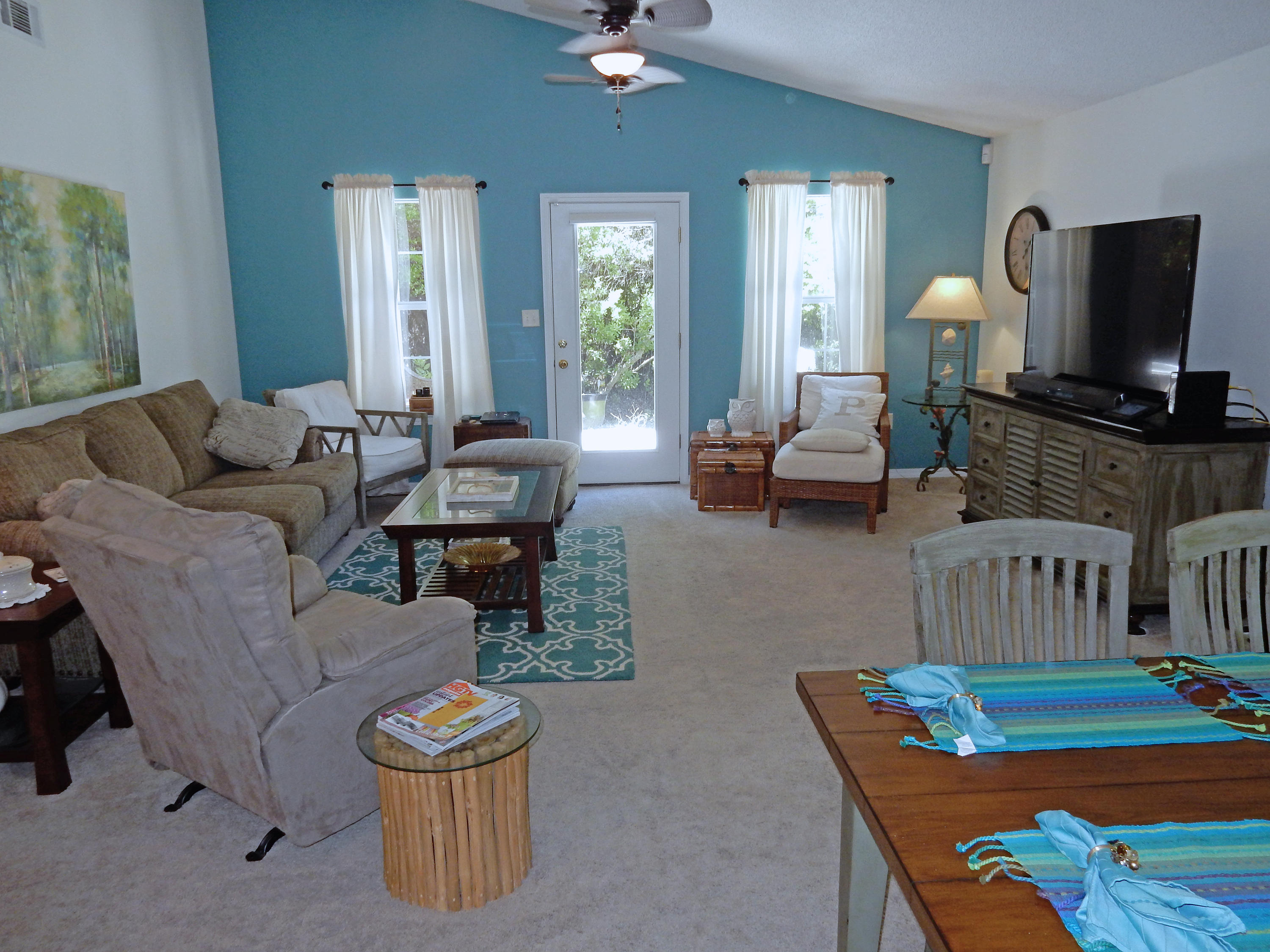 PRIVATE & PROTECTED! This wonderful 4 bedroom 2 bath home is at a dead end with both the north and west side butting up against lush forested wetlands.